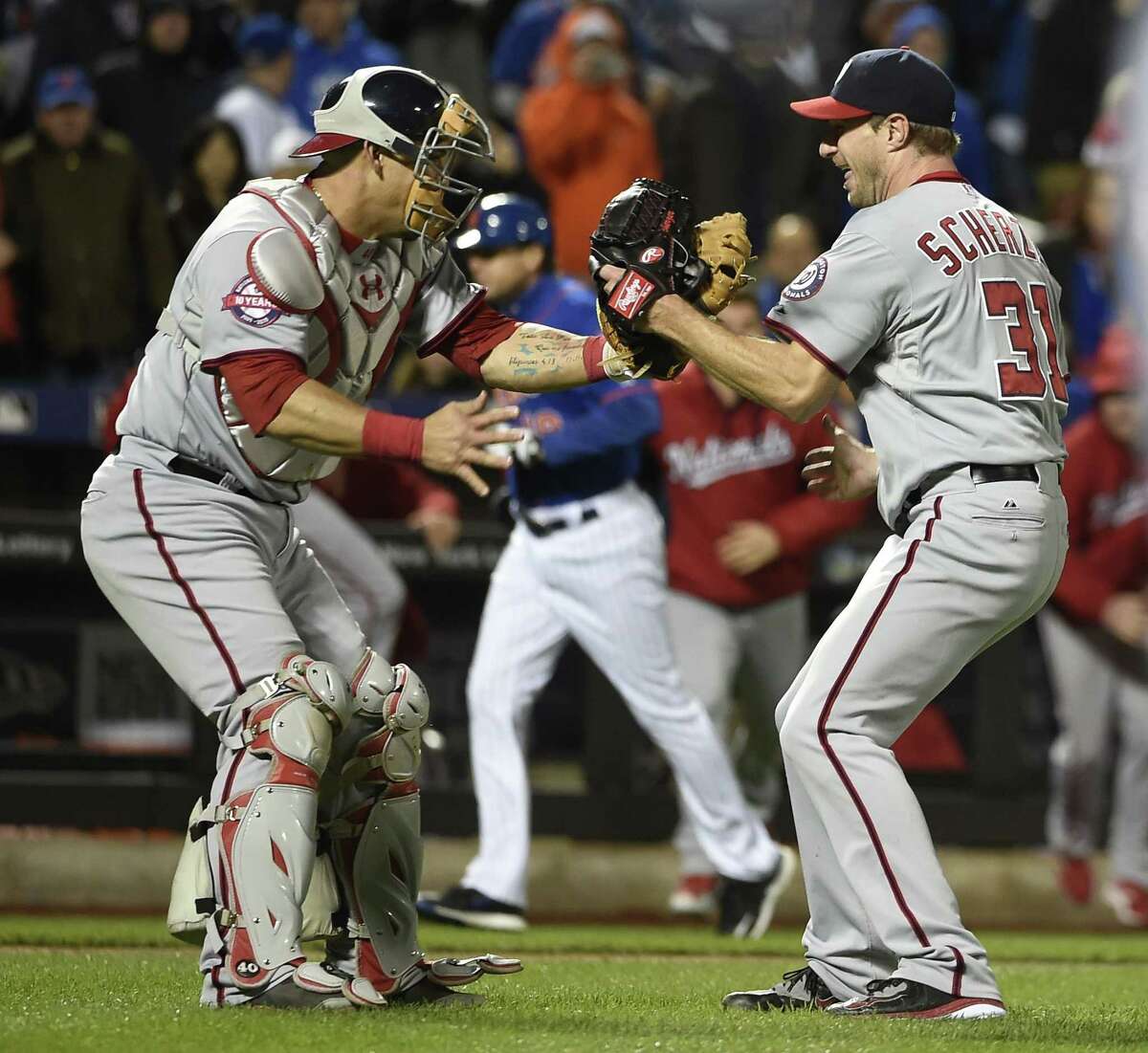 Nationals starting pitcher Max Scherzer (31) celebrates his no-hitter against the Mets with catcher Wilson Ramos on Saturday.