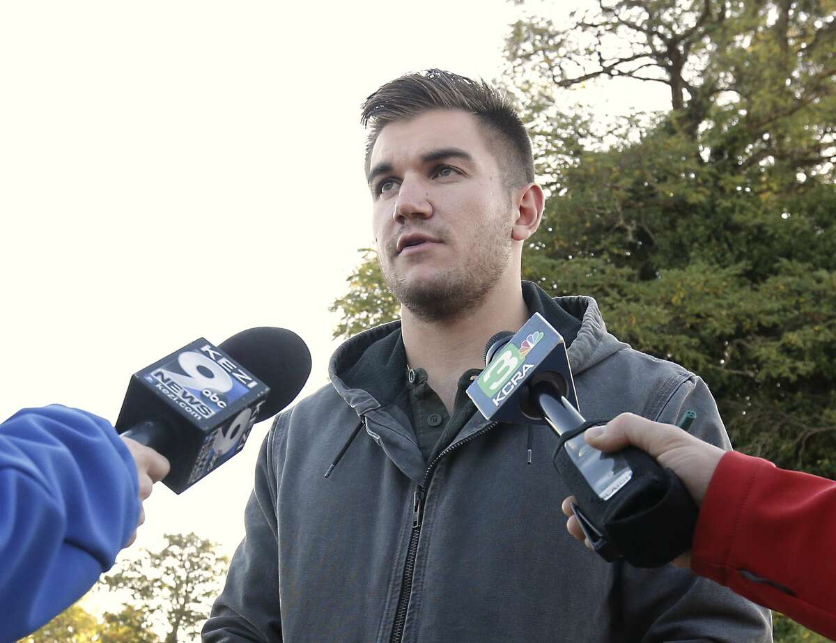 Alek Skarlatos, one of the three Americans who stopped a terrorist attack aboard a Paris-bound train in August, talks to reporters about the shooting at Umpqua Community College, Friday, Oct. 2, 2015, in Roseburg, Ore. Skarlatos said he would have been attending a class at the college when a gunman killed people Thursday if he had not been in Los Angeles to rehearse for ABC’s “Dancing With the Stars.”