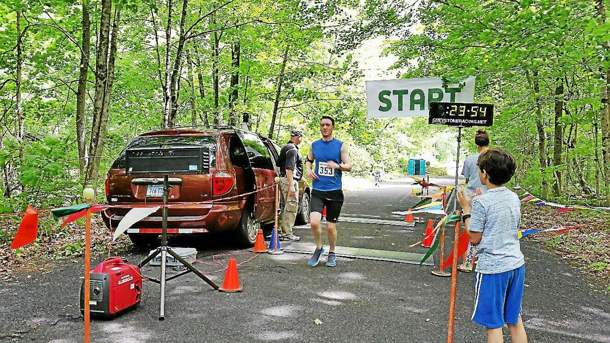 Chris Fernald, 31, of Southington finished in fourth place overall with a time of 23:51 at Saturday afternoon’s second annual Wheels and Heels 5K Road Race on Valley Road in Harwinton.
