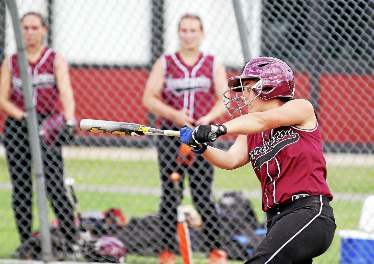 Marianne Killackey — Register Citizen Torrington’s Alexis Tyrrell connects for a three run homer in the third inning against East Lyme in Round Two of the state tournament.