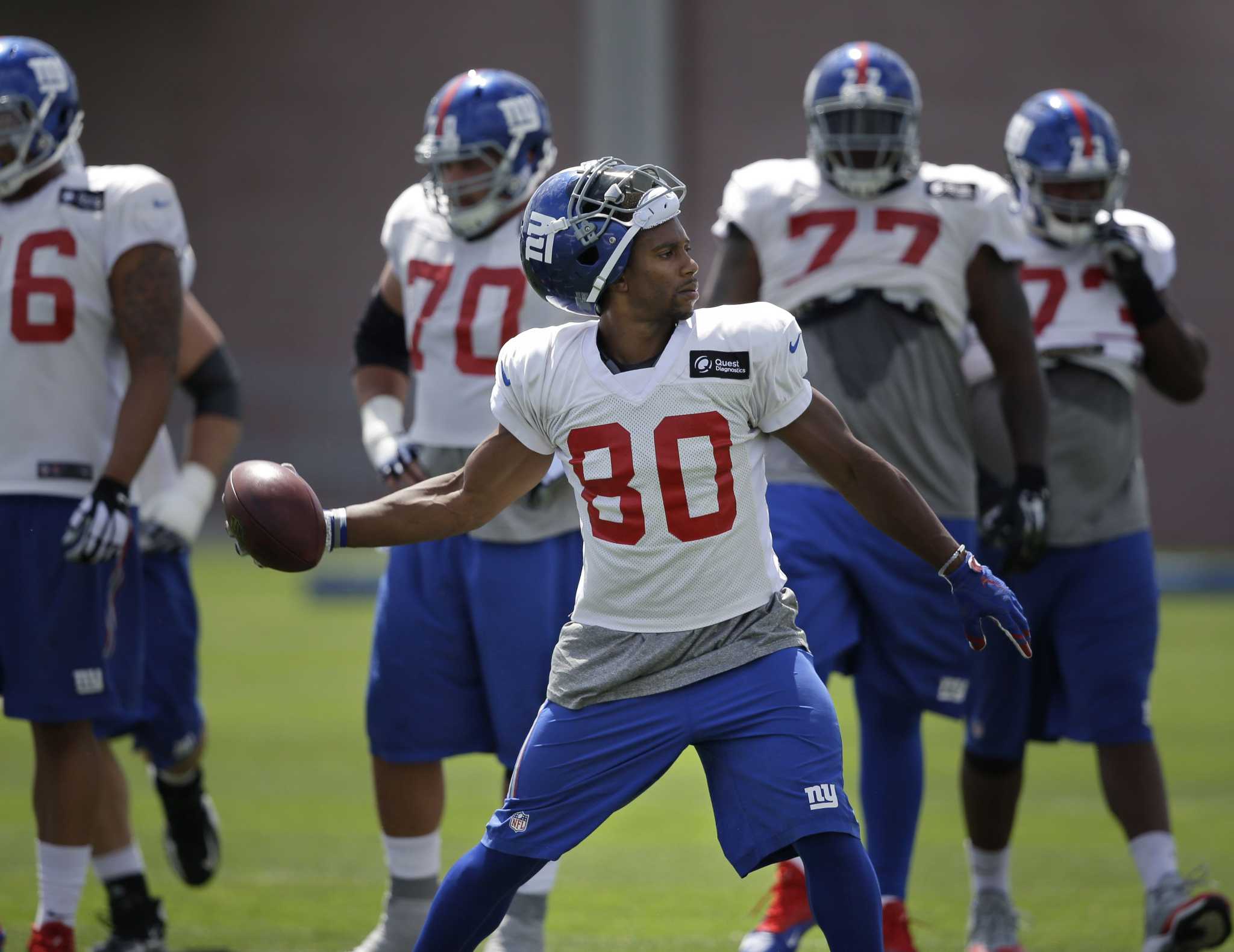Tom Coughlin says Victor Cruz will miss Giants game with Bills