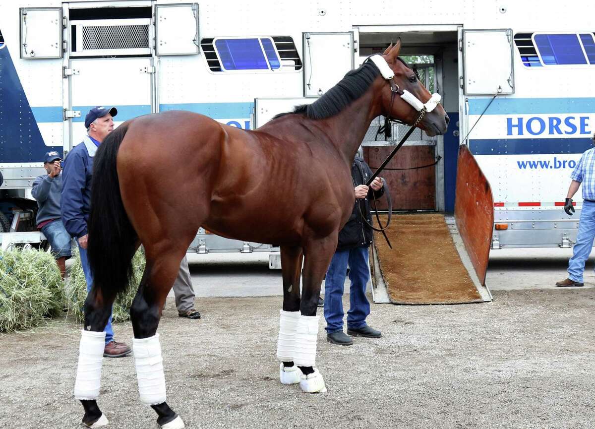 American Pharoah is led to a trailer at Churchill Downs in Louisville, Ky.