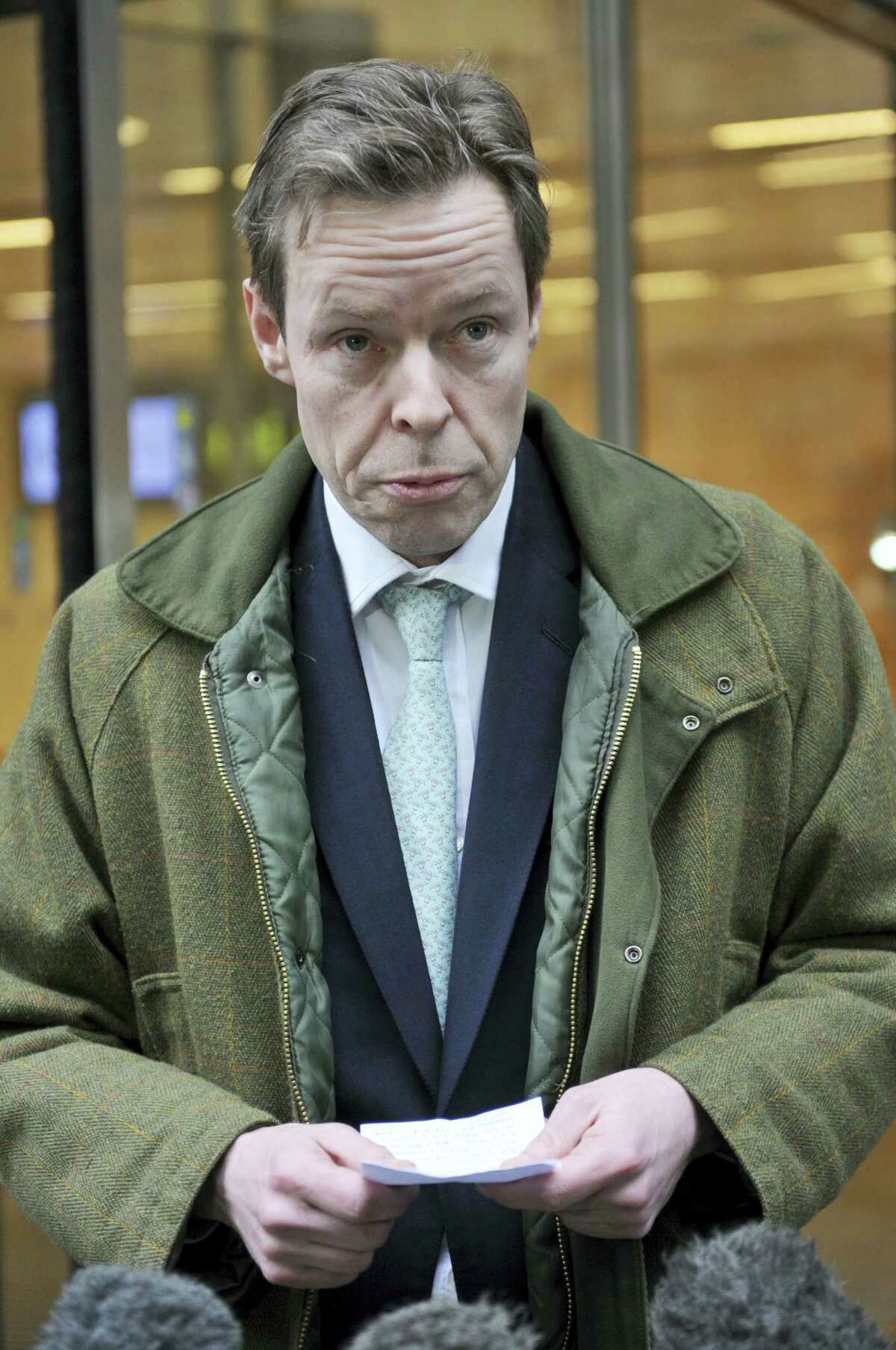 George Bingham, the only son of missing peer Lord Lucan, speaks to the media outside the High Court in London, where he was granted a death certificate by a High Court judge Wednesday Feb. 3, 2016. The only son of the notorious Lord Lucan, who has been missing since 1974 when a woman was found dead in his home, has been granted a death certificate in his father’s case.