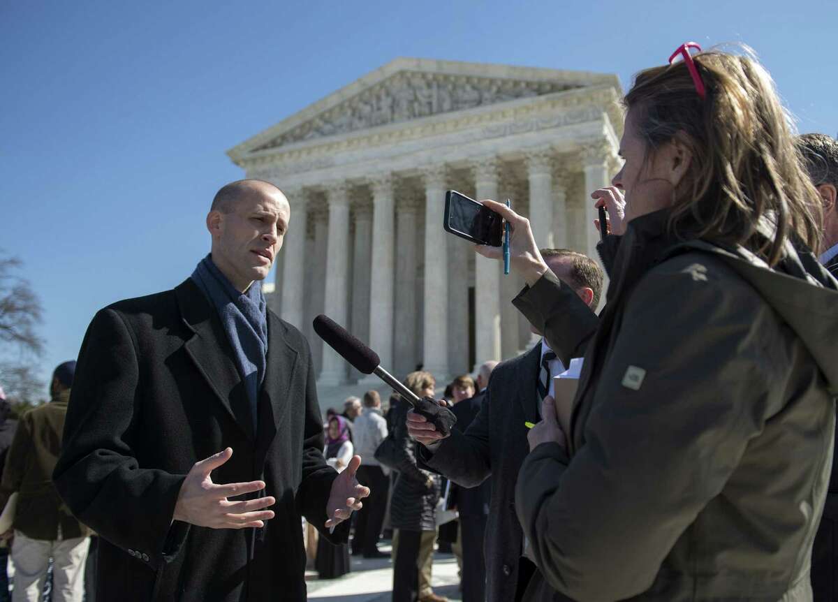 Texas Solicitor General Scott Keller, attorney for petitioners, speaks to reporters outside the Supreme Court in Washington on March 23 after the court heard arguments in Walker v. Sons of Confederate Vets case.