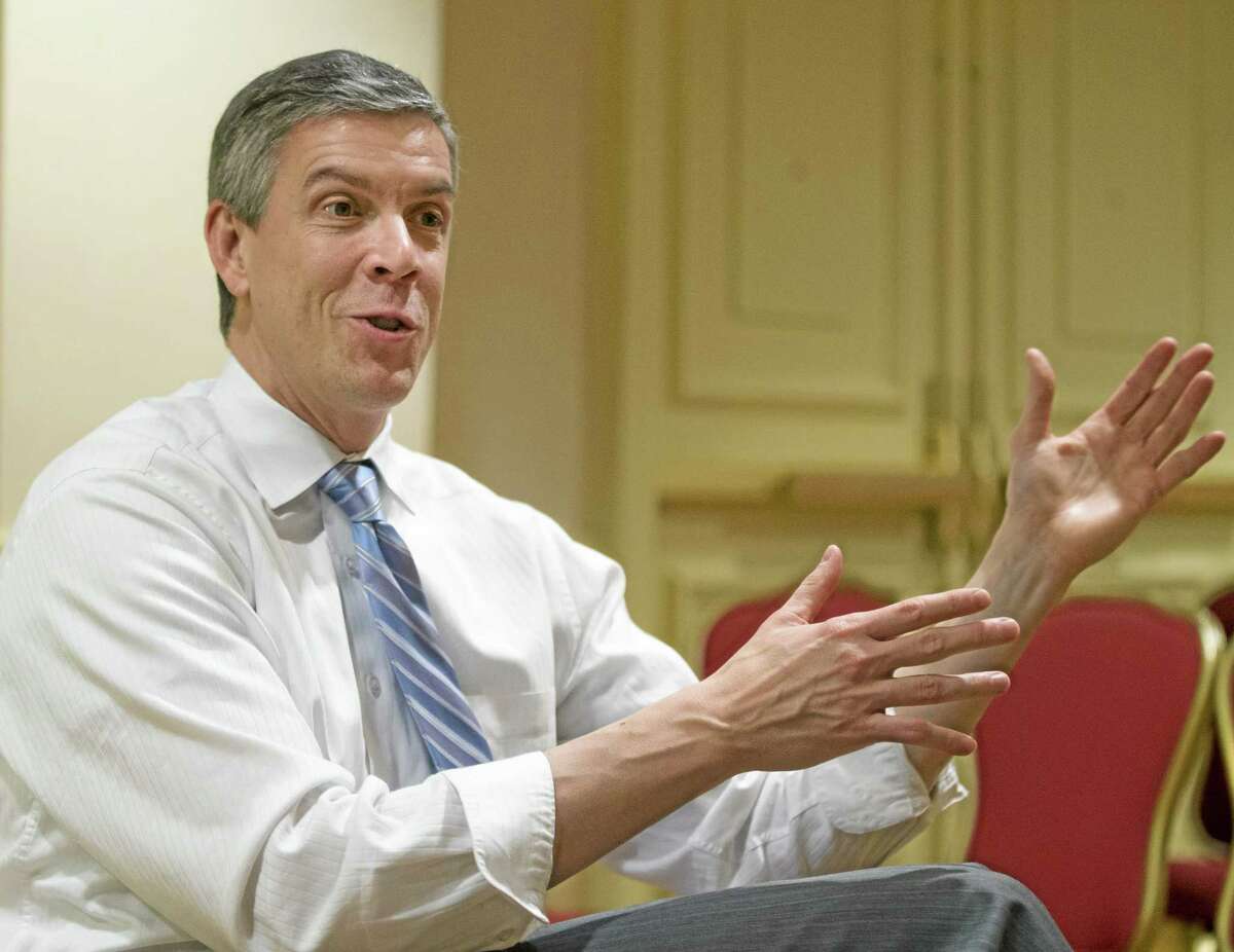 In this Jan. 17, 2013, file photo, Education Secretary Arne Duncan gestures as speaks to the Associated Press during an interview in Washington related to No Child Left Behind. States can request permission to ignore parts of the No Child Left Behind education law through the spring of 2016, the Education Department has said.