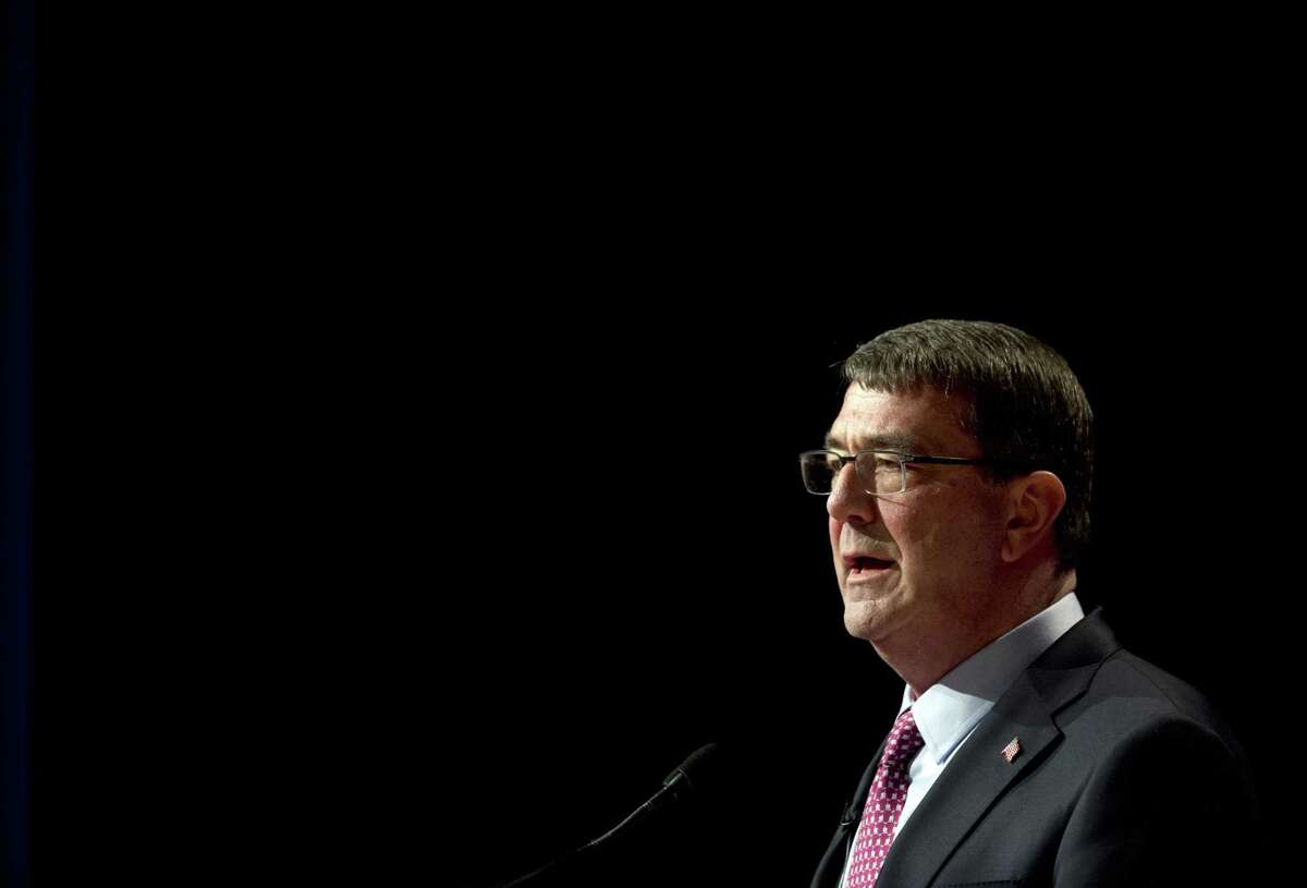 This March 6, 2015 photo shows Defense Secretary Ash Carter speaking during a ceremonial swearing-in ceremony at the Pentagon.