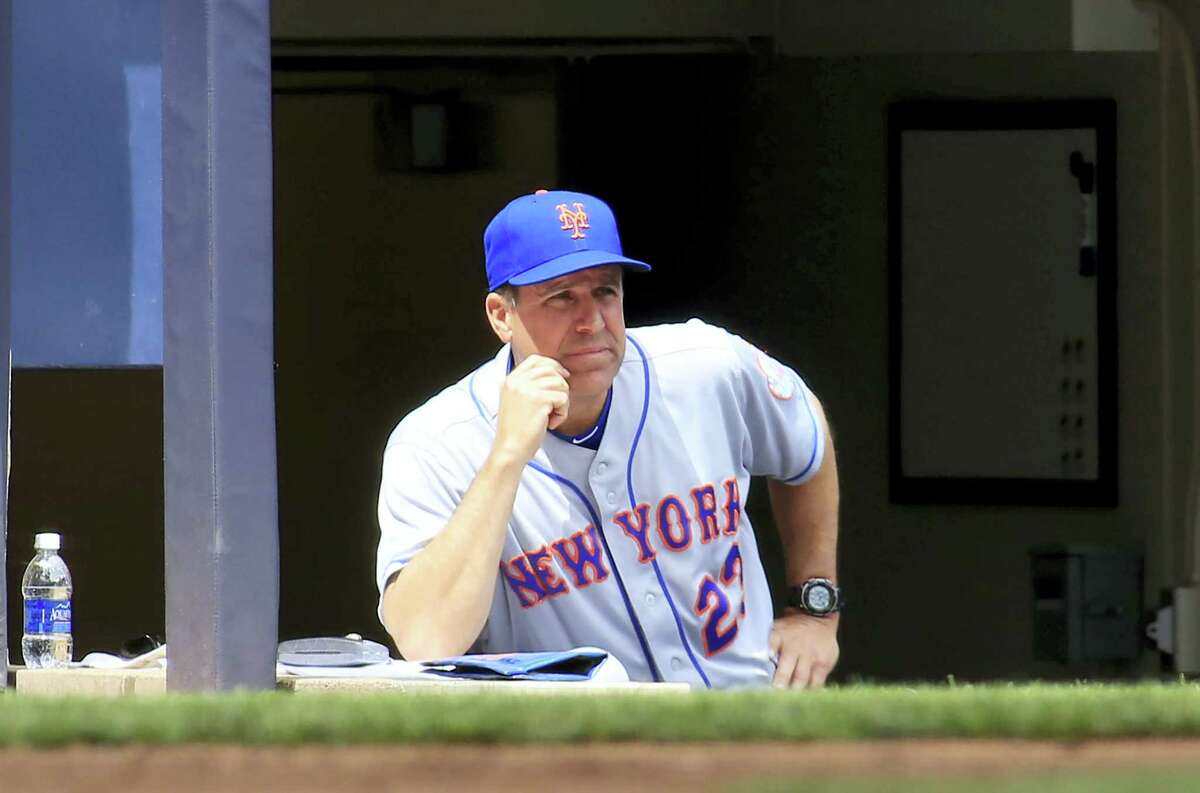 Mets bench coach Dick Scott looks on after head coach Terry Collins was taken to the hospital on Sunday in Milwaukee.