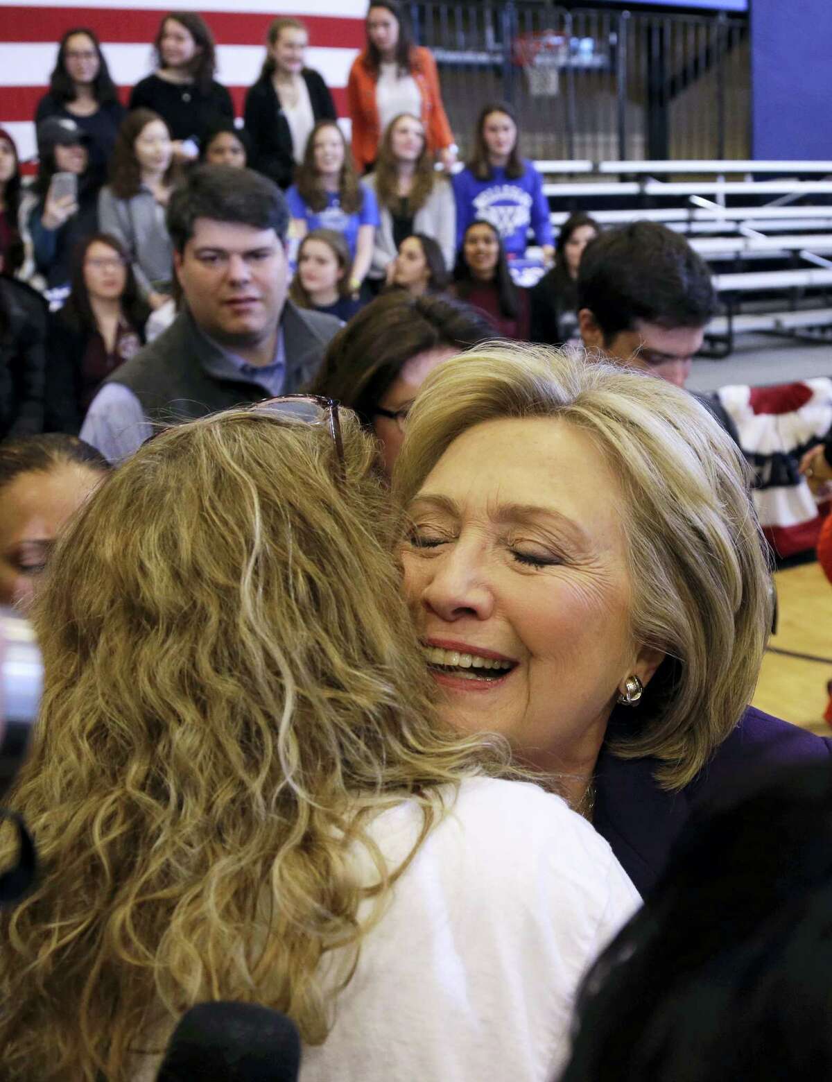 Democratic presidential candidate Hillary Clinton hugs a supporter at a campaign event, Tuesday, Feb. 2, 2016, in Nashua, N.H.