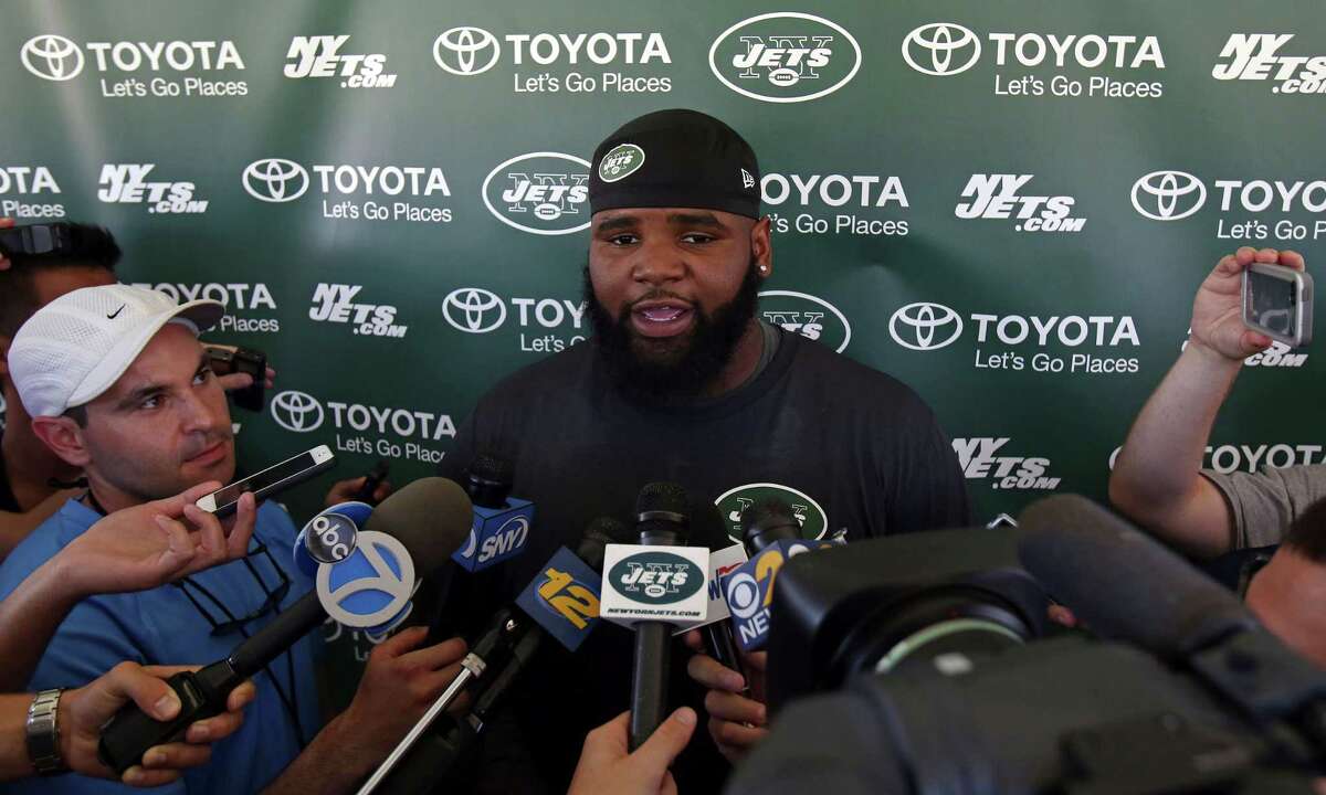 New York Jets defensive end Sheldon Richardson talks with reporters at NFL football training camp in Florham Park, N.J., Friday.