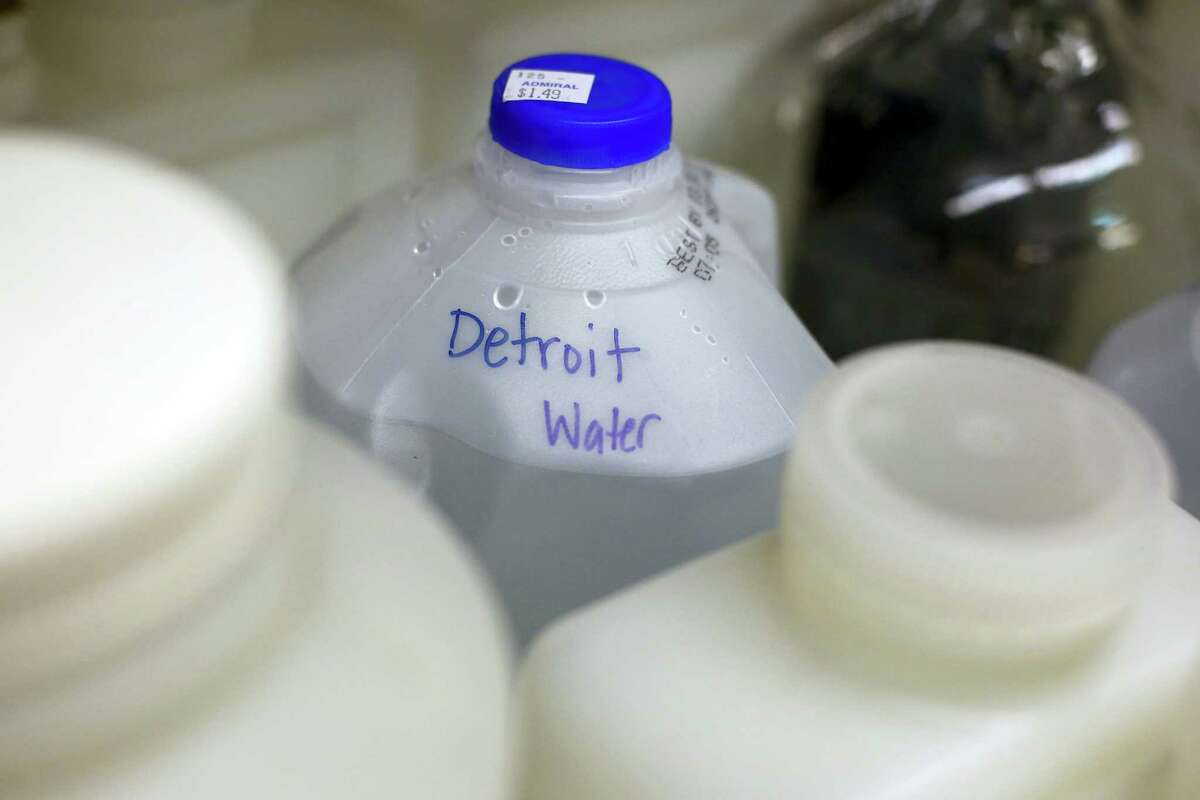 A jug of water labeled “Detroit Water” sits among other containers collected in Flint, Mich., in the Fluvial Processes, Pipeline Corrosion lab on the Virginia Tech campus in Blacksburg Va.