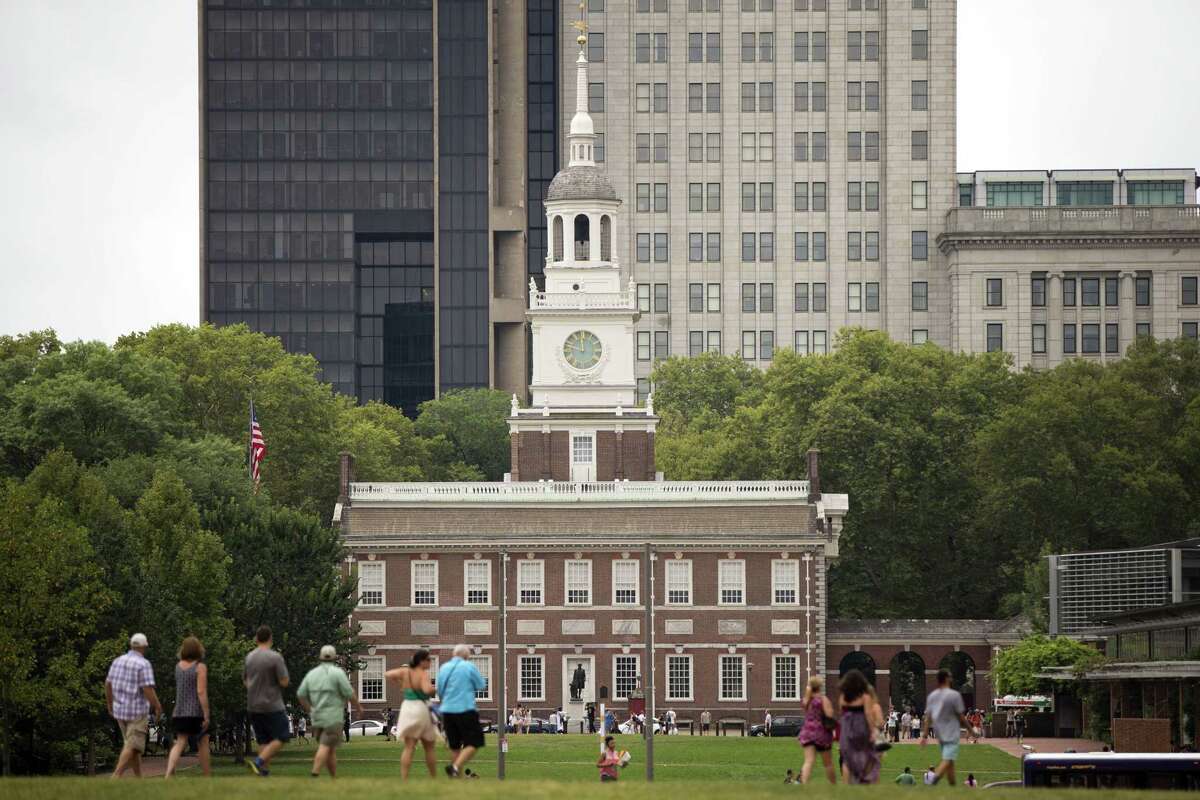 Tourists walk in view of Independence Hall in Philadelphia. Pope Francis is scheduled to speak on religious freedom and immigration in the shadow of Independence Hall during his visit to the United States.