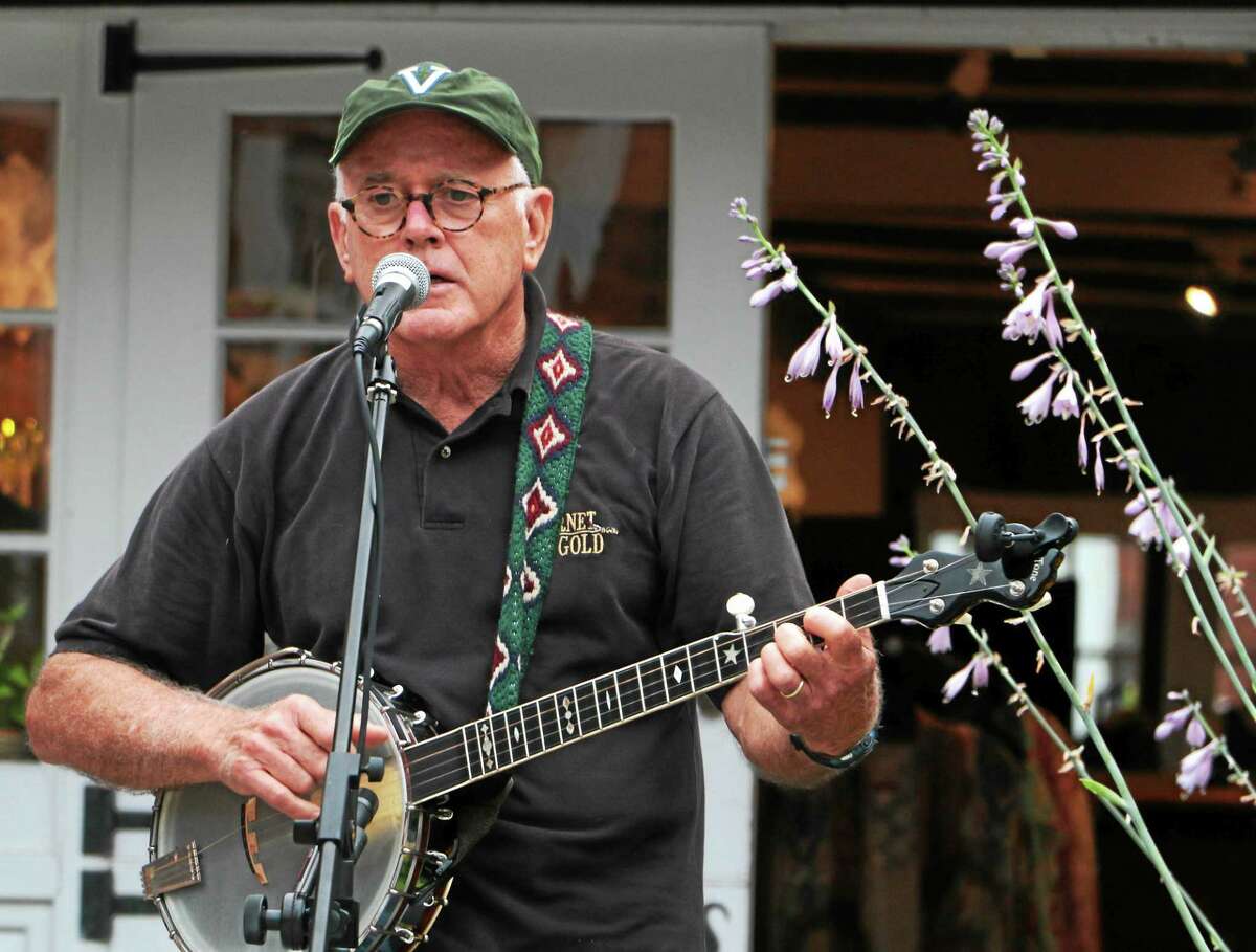 Mike Delay of Western Lands Trio performs in Litchfield Thursday evening.