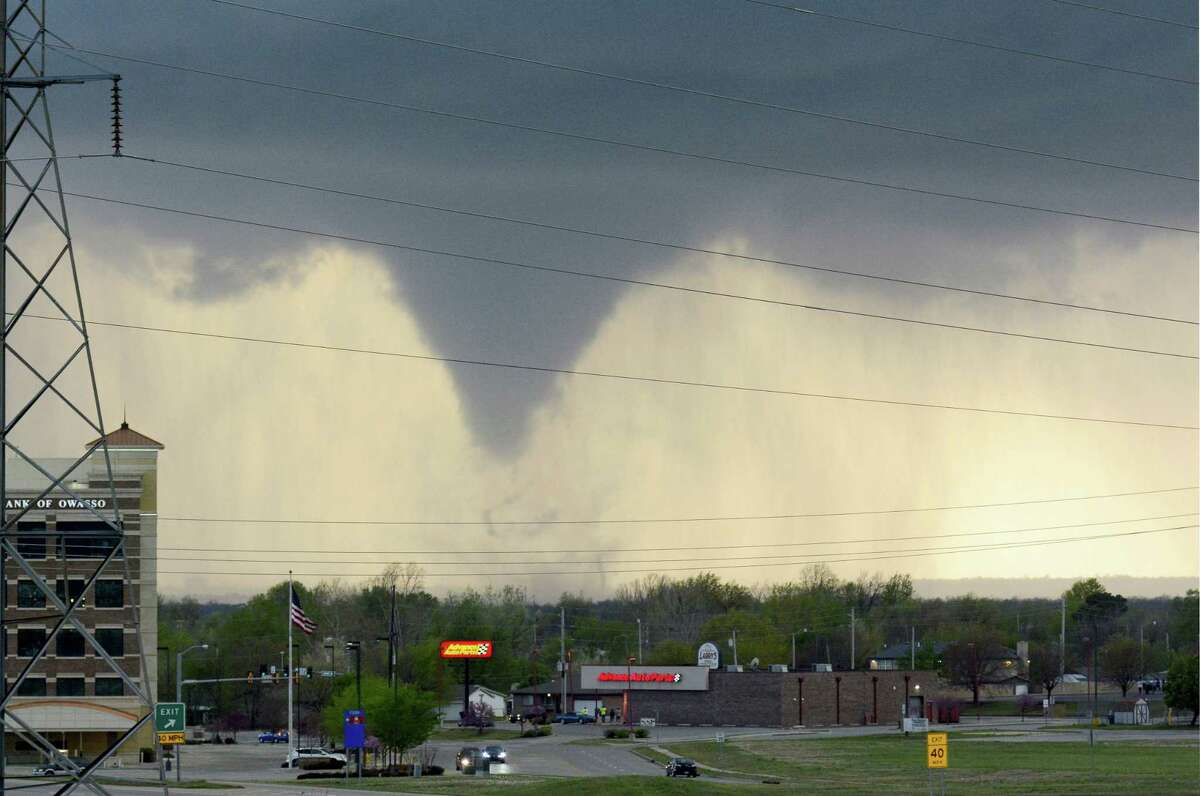 A tornado touches down in Tulsa, Okla., on Wednesday, March 30, 2016. The National Weather Service is confirming multiple tornado touchdowns in the Tulsa area.