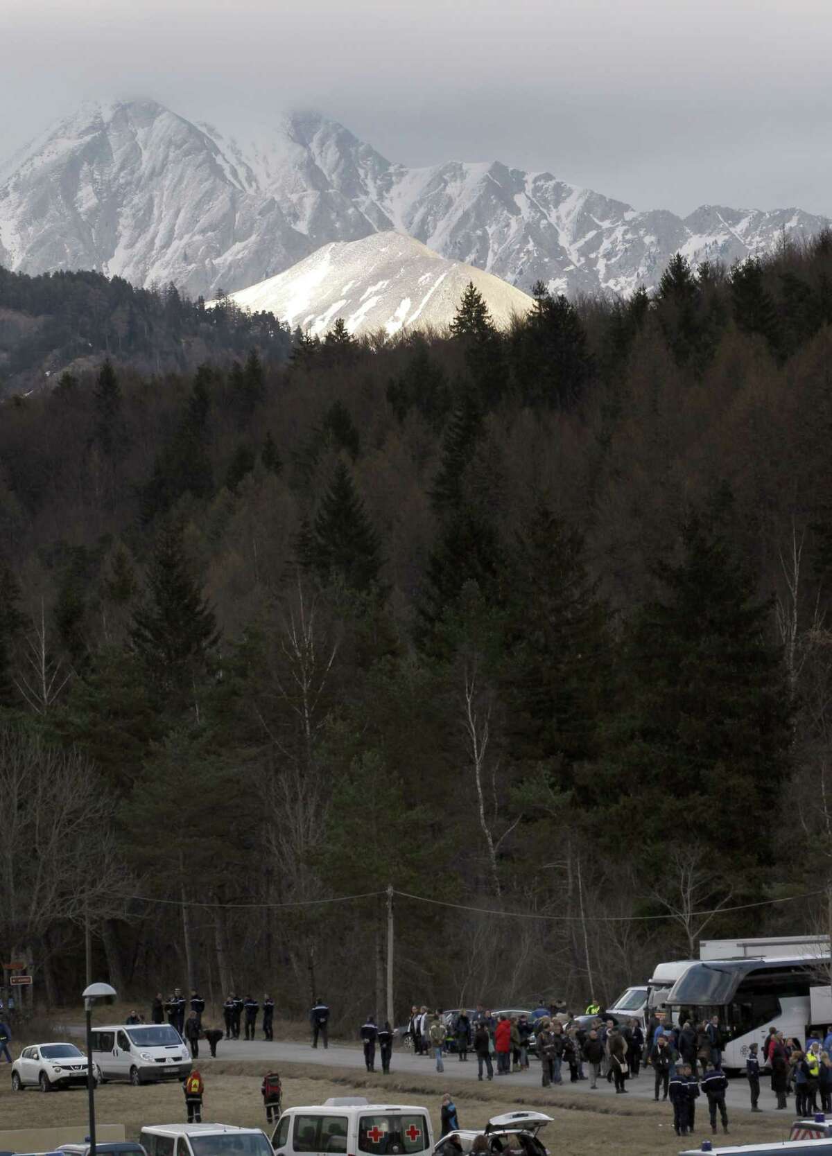 Family members of people involved in Germanwings jetliner that crashed on Tuesday in the French Alps arrive for a gathering in Le Vernet, France Thursday, March 26, 2015. The co-pilot of the Germanwings jet barricaded himself in the cockpit and ìintentionallyî rammed the plane full speed into the French Alps, ignoring the captainís frantic pounding on the cockpit door and the screams of terror from passengers, a prosecutor said Thursday. In a split second, he killed all 150 people aboard the plane. (AP Photo/Christophe Ena)