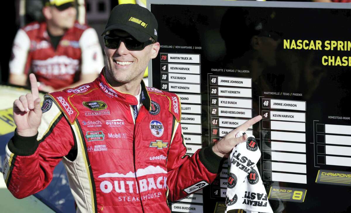 Kevin Harvick advanced to the next round of NASCAR’s Chase for the Sprint Cup with a win Sunday at Kansas Speedway.