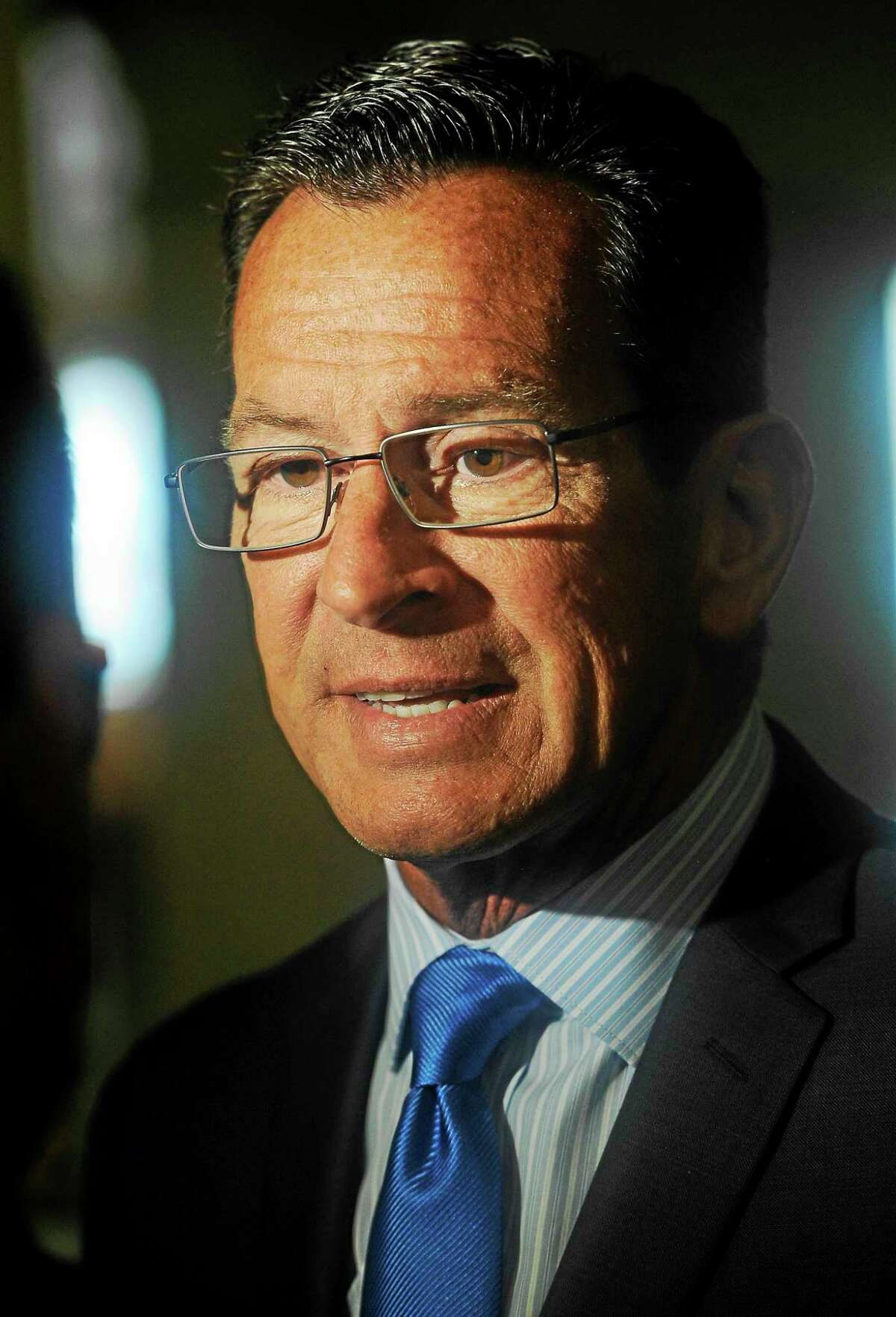 In this June 30 file photo, Gov. Dannel P. Malloy speaks to the media after signing the budget.
