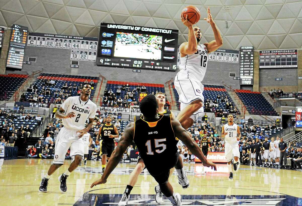 UConn’s R.J. Evans goes up for a basket against AIC back in a 2012 game.