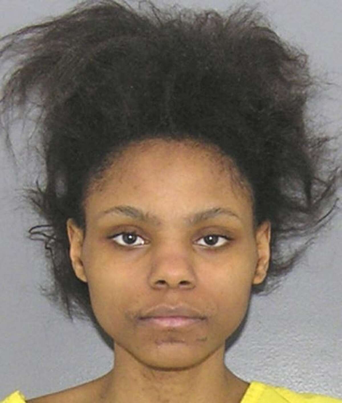 FILE - This booking photo provided by the Hamilton County, Ohio Sheriff shows Deasia Watkins in Cincinnati. Accused of decapitating her 3-month-old daughter with a chef's knife, Watkins was indicted Wednesday, March 25, 2015 on a charge of aggravated murder. (AP Photo/Hamilton County Sheriff)