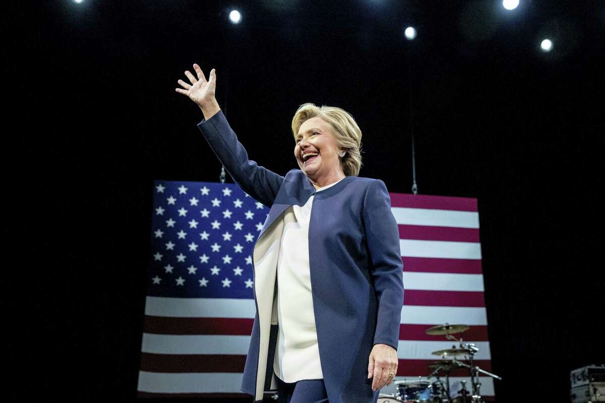 Democratic presidential candidate Hillary Clinton waves after speaking at a fundraiser at the Civic Center Auditorium in San Francisco, Thursday.