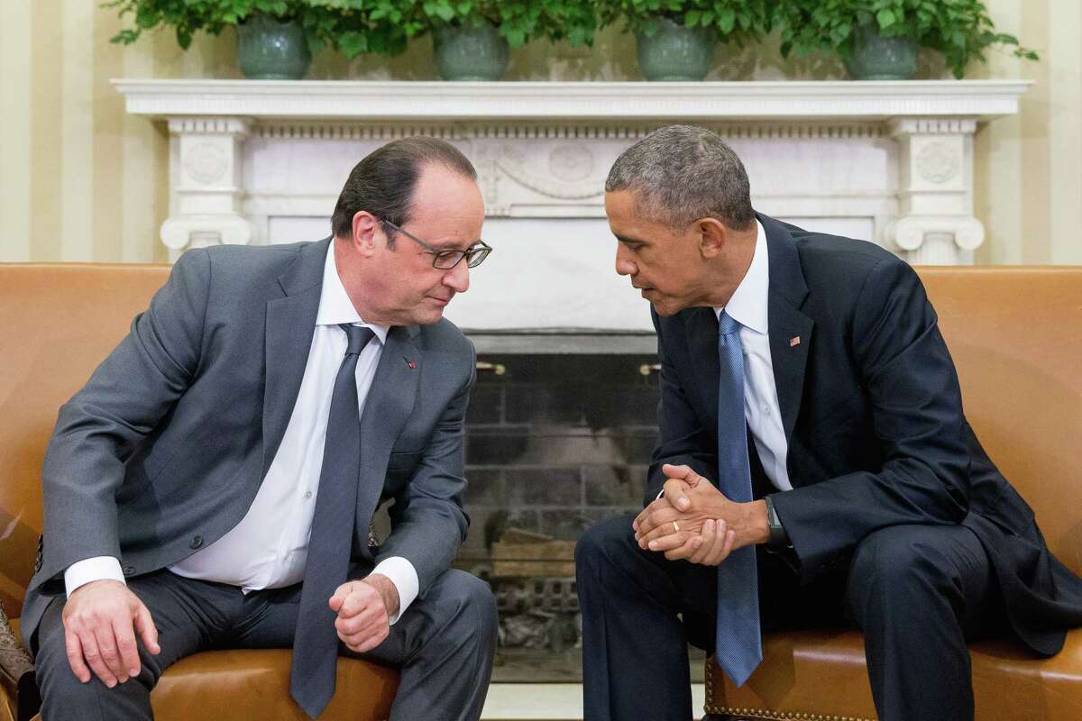 President Barack Obama meets with President Francois Hollande of France in the Oval Office of the White House in Washington Tuesday. Hollande’s visit to Washington is part of a diplomatic offensive to get the international community to bolster the campaign against the Islamic State militants.