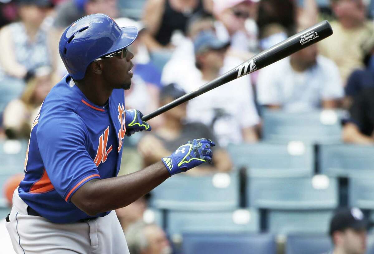 The New York Mets’ John Mayberry Jr. watches his solo home run off New York Yankees starter Masahiro Tanaka in the fourth inning of Wednesday’s spring training game in Tampa, Fla.