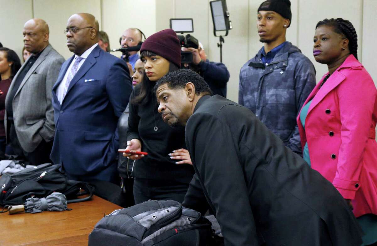 Members of the black community listen as County Attorney Mike Freeman announces Wednesday, March 30, 2016 that no charges will be filed against two Minneapolis police officers in the fatal shooting of a black man, Jamar Clark, last November, in Minneapolis. Clark’s shooting sparked weeks of largely peaceful protests in Minneapolis, including an 18-day encampment outside a police precinct.