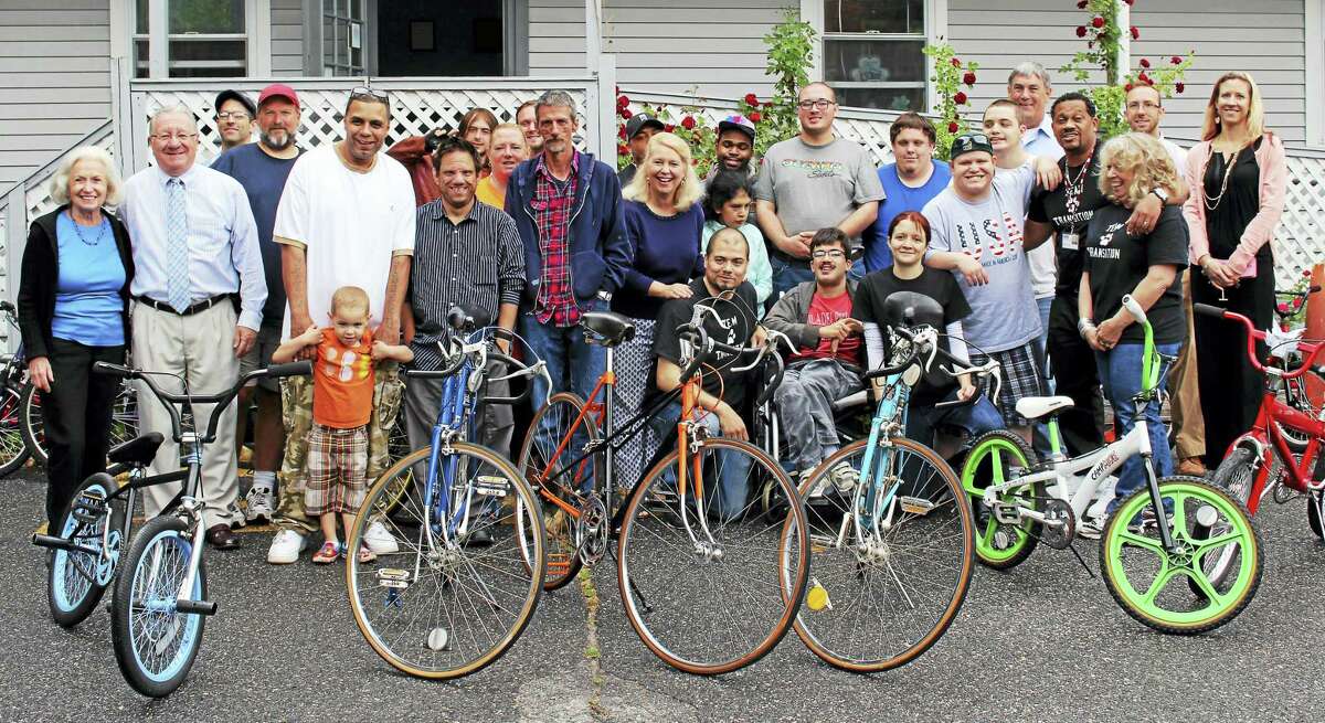 Contributed photo - LARC, Torrington Students in LARC’s School to Community Transition Program donated 21 refurbished bicycles to residents living at FISH/Friends in Service to Humanity of Northwest Connecticut, on June 3.