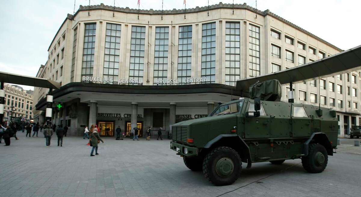 A Belgian army armoured vehicle stands parked in front of the central railway station in Brussels, Monday, Nov. 23, 2015. Three days of the highest terror alert and unprecedented measures that have closed down the city’s subways, schools and main stores, has created a very different atmosphere as the Belgian capital tries to avoid attacks similar to the ones that caused devastating carnage in Paris.