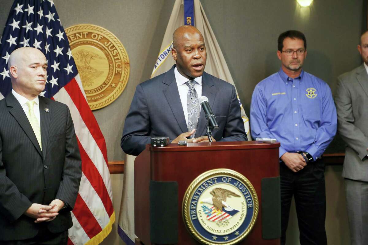 FBI Special Agent in Charge Eric Jackson talks about the FBI’s roll in stopping a bomb plot. Acting U.S. Attorney Tom Beall, left, announced Friday a major federal investigation stopped a domestic terrorism plot by a militia group to detonate a bomb at a Garden City apartment complex where a number of Somalis live. Two Liberal men and a Dodge City resident were arrested and charged in federal court with domestic terrorism charges, Beall told reporters at a news conference in downtown Wichita.