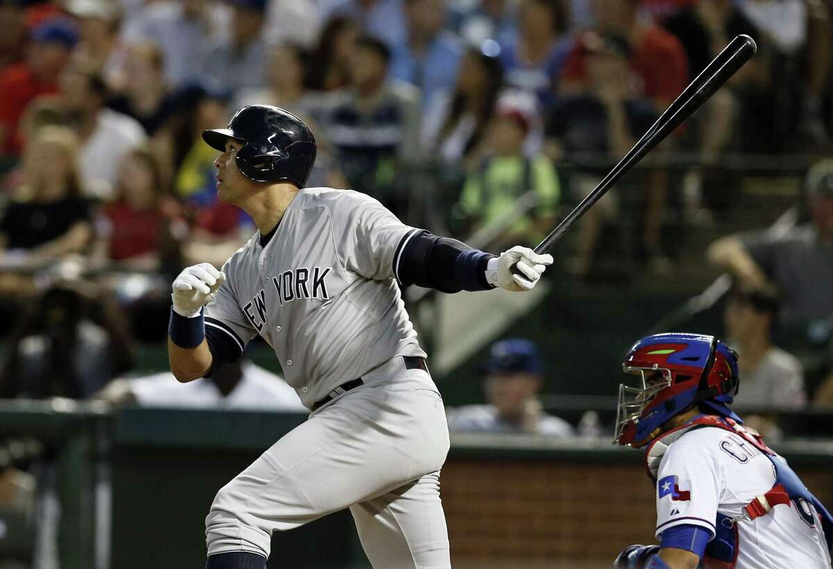 Alex Rodriguez follows through on a solo home run in the sixth inning Monday.