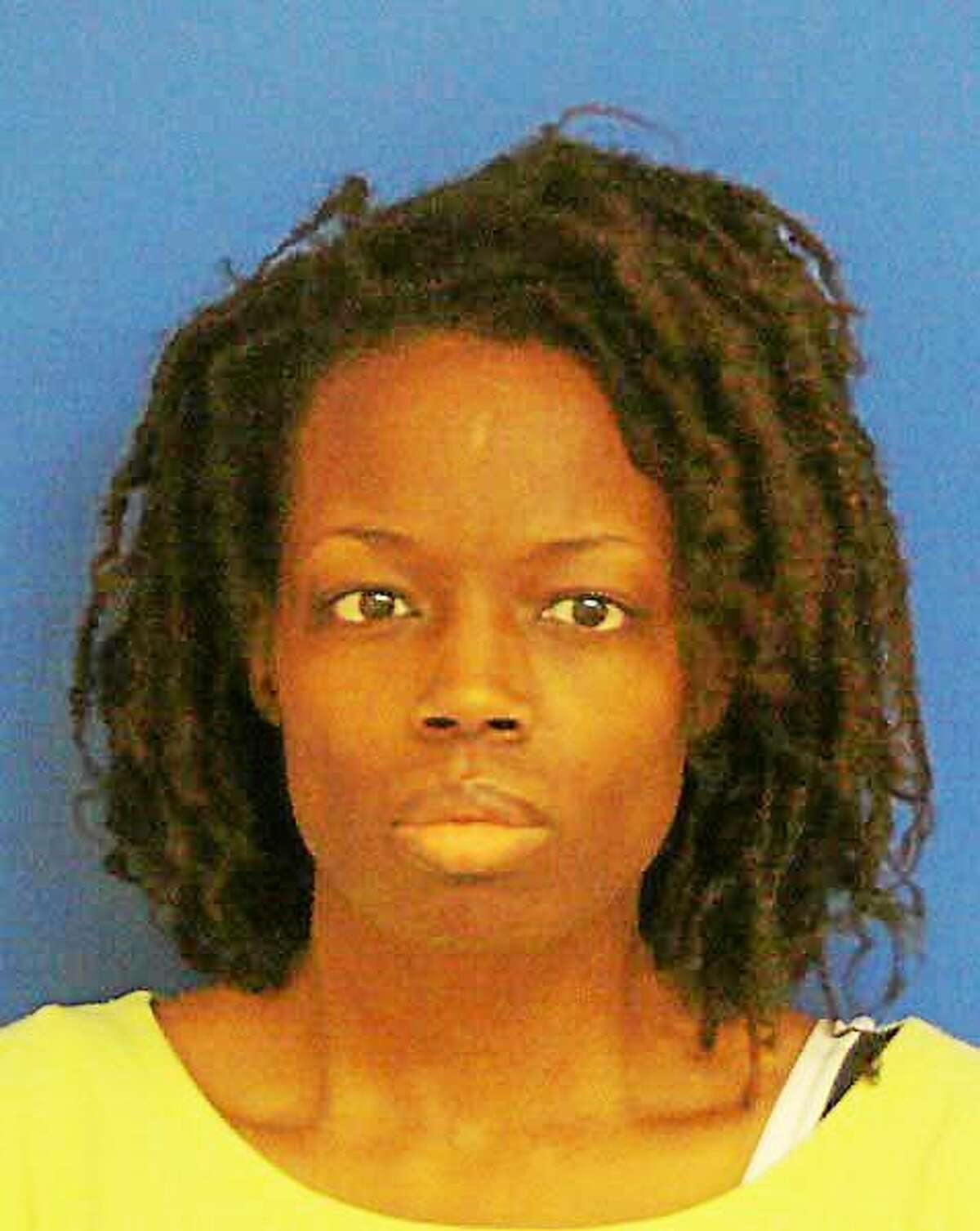 LeRoya D. Moore of East Haven is charged with murder in the deaths of her two children at their home.
