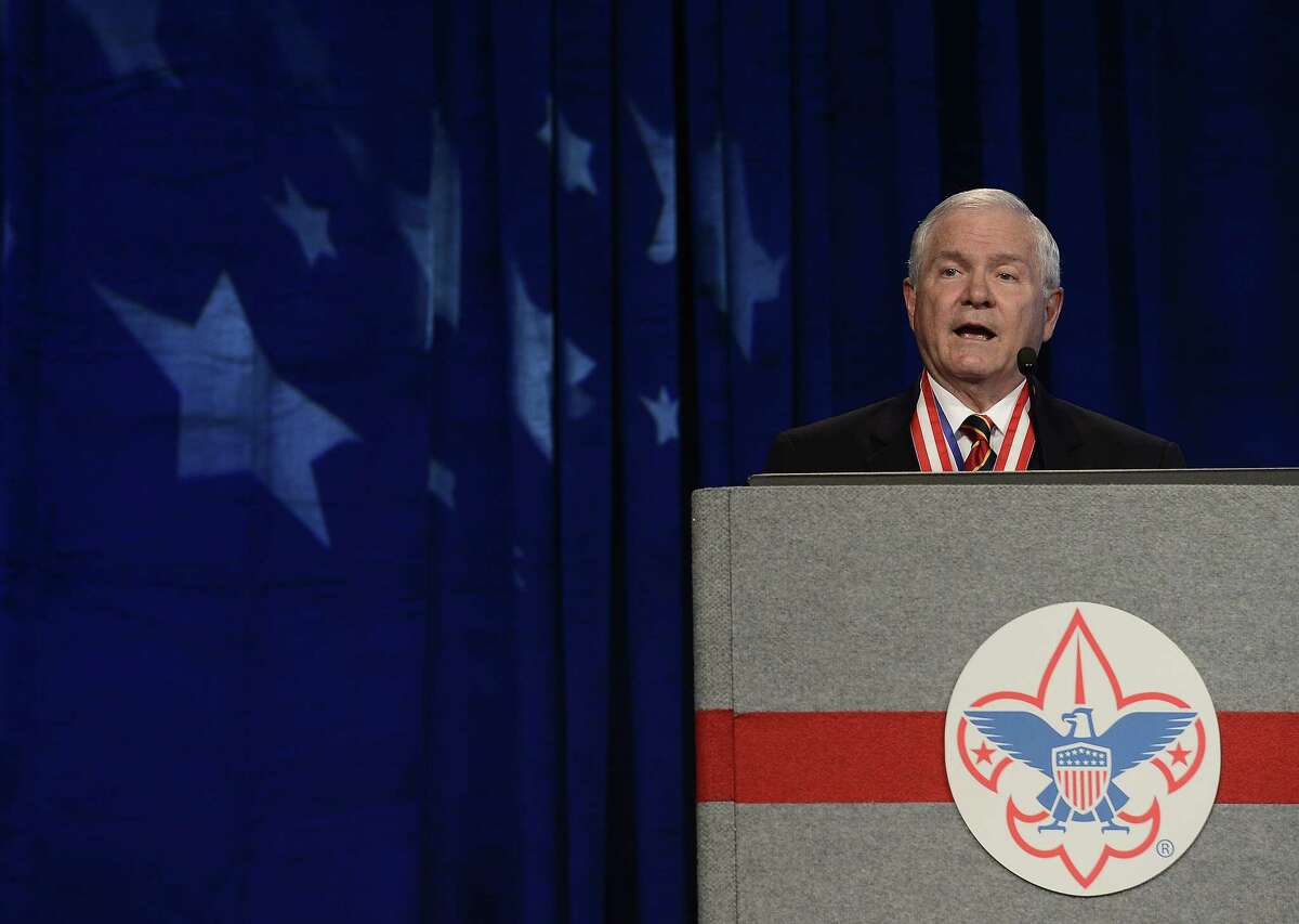 In this May 23, 2014 photo, former Defense Secretary Robert Gates addresses the Boy Scouts of America’s annual meeting in Nashville, Tenn., after being selected as the organization’s new president.
