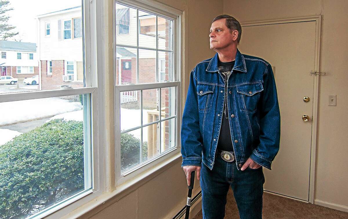 WEST HAVEN, CT March 13, 2015 Jeffrey Murdock looks out the window of his West Haven apartment he recently moved into after serving time in Connecticut prisons. Murdock is one of 48 incarcerated veterans, who have been have been helped since June by the VA jail release program.