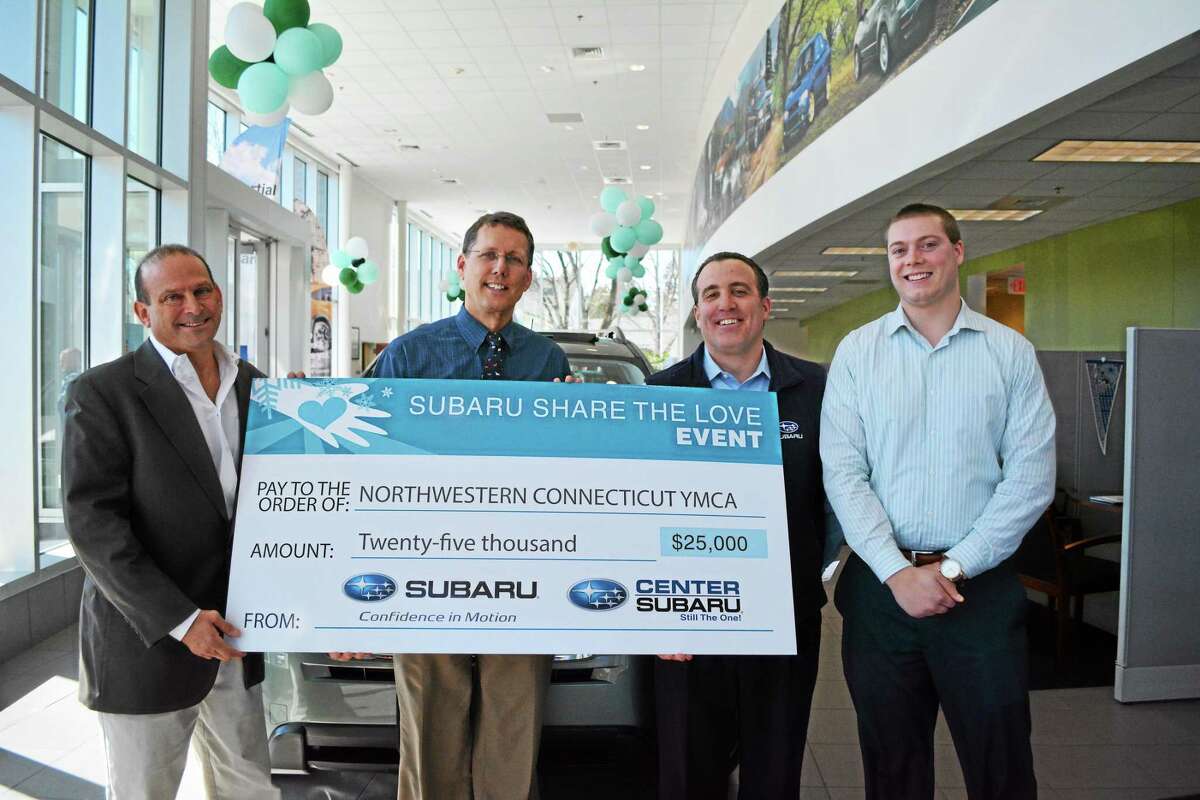 Representatives of Center Subaru presented a check for $25,000 to the Northwest CT YMCA Monday afternoon.