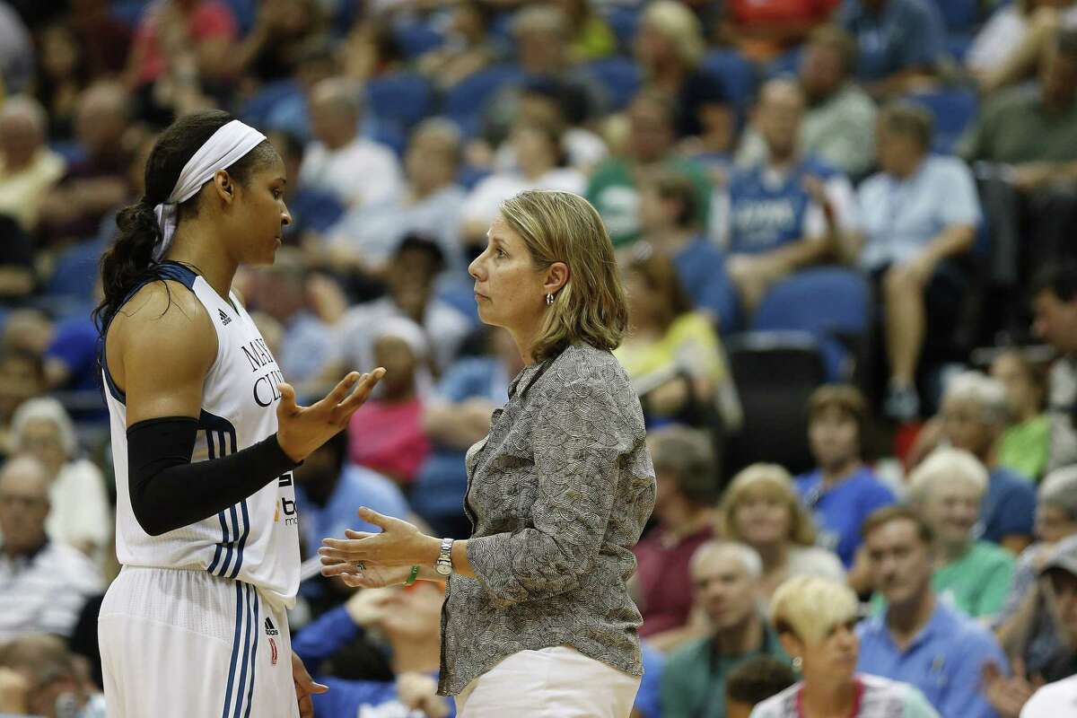 Minnesota Lynx forward Maya Moore talks with head coach Cheryl Reeve during Wednesday’s game against the Connecticut Sun in Minneapolis.
