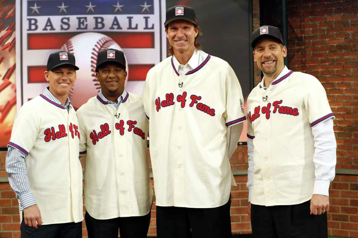 In this Jan. 7 file photo, members of the National Baseball Hall of Fame 2015 inductee class, from left, Craig Biggio, Pedro Martinez, Randy Johnson and John Smoltz, pose for photographers at the MLB Network’s Studio 42 in Secaucus, N.J.
