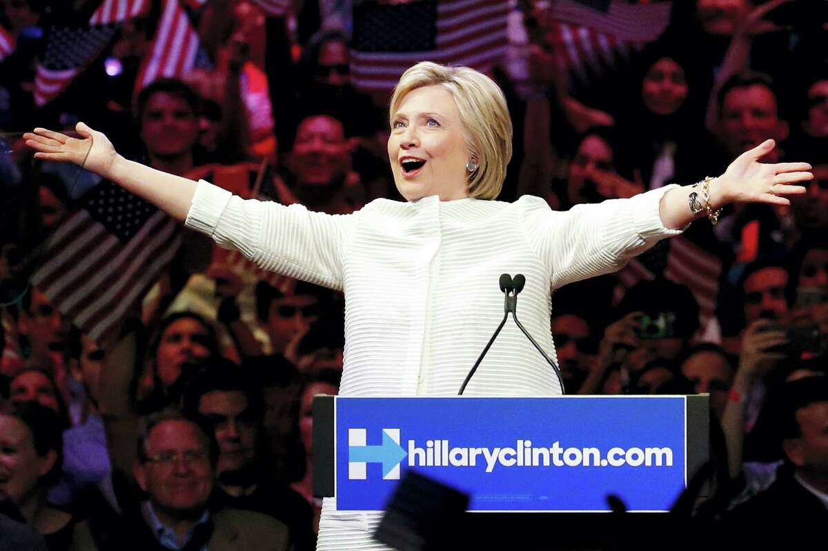 Democratic presidential candidate Hillary Clinton gestures as she greets supporters at a presidential primary election night rally, Tuesday, June 7, 2016, in New York.