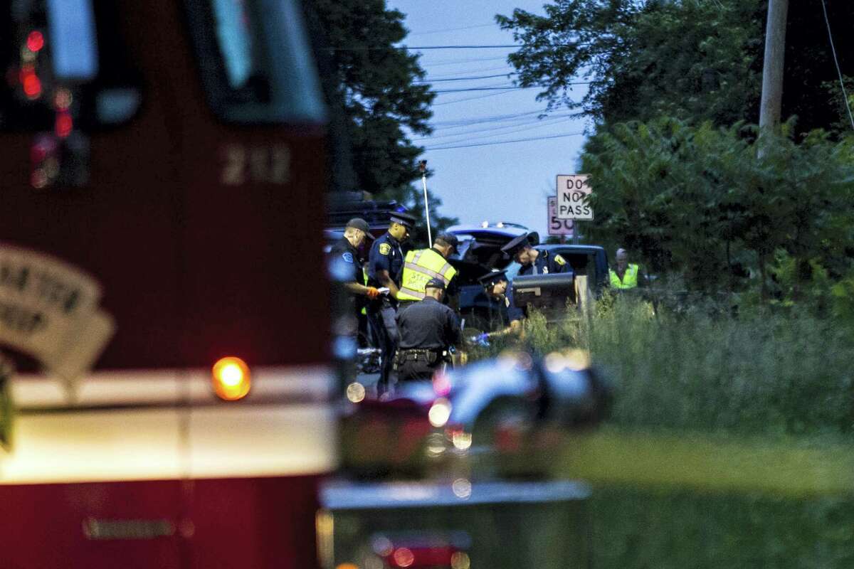 Police and rescue workers were rushing to the 5500 block of North Westnedge Avenue to help cyclists who were apparently struck and badly injured by a truck in a hit-and-run collision on Tuesday, June 7, 2016, in Kalamazoo, Mich.