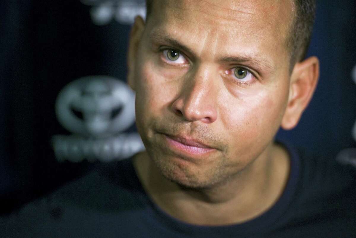 New York Yankees' Alex Rodriguez talks with reporters outside the clubhouse before a spring training baseball game with the Tampa Bay Rays, Thursday, March 24, 2016, in Tampa, Fla. (AP Photo/Steve Nesius)