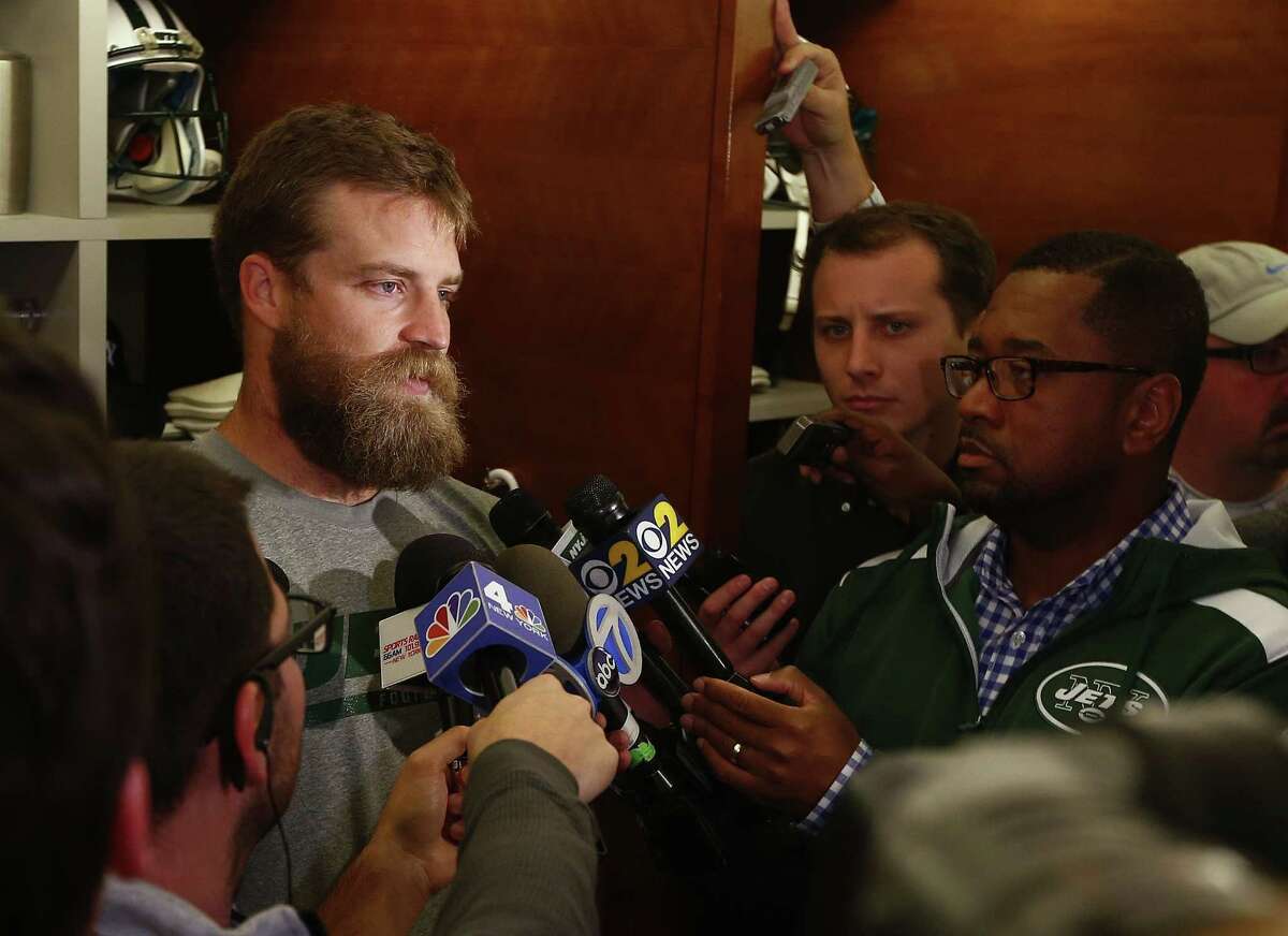 New York Jets quarterback Ryan Fitzpatrick talks to the media after practice at the team’s facility on Wednesday in Florham Park, N.J.