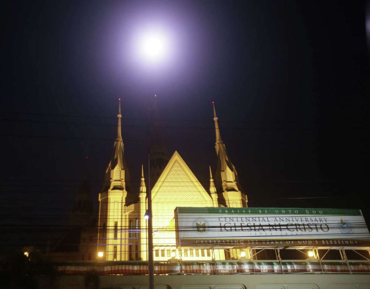 In this photo taken July 23, 2015, the central temple of the Iglesia Ni Cristo or Church of Christ is seen in suburban Quezon city northeast of Manila, Philippines. A politically influential and secretive Christian church that's involved in a legal dispute with American R&B singer Chris Brown has been caught in a rising tide of its own legal troubles. (AP Photo/Bullit Marquez)