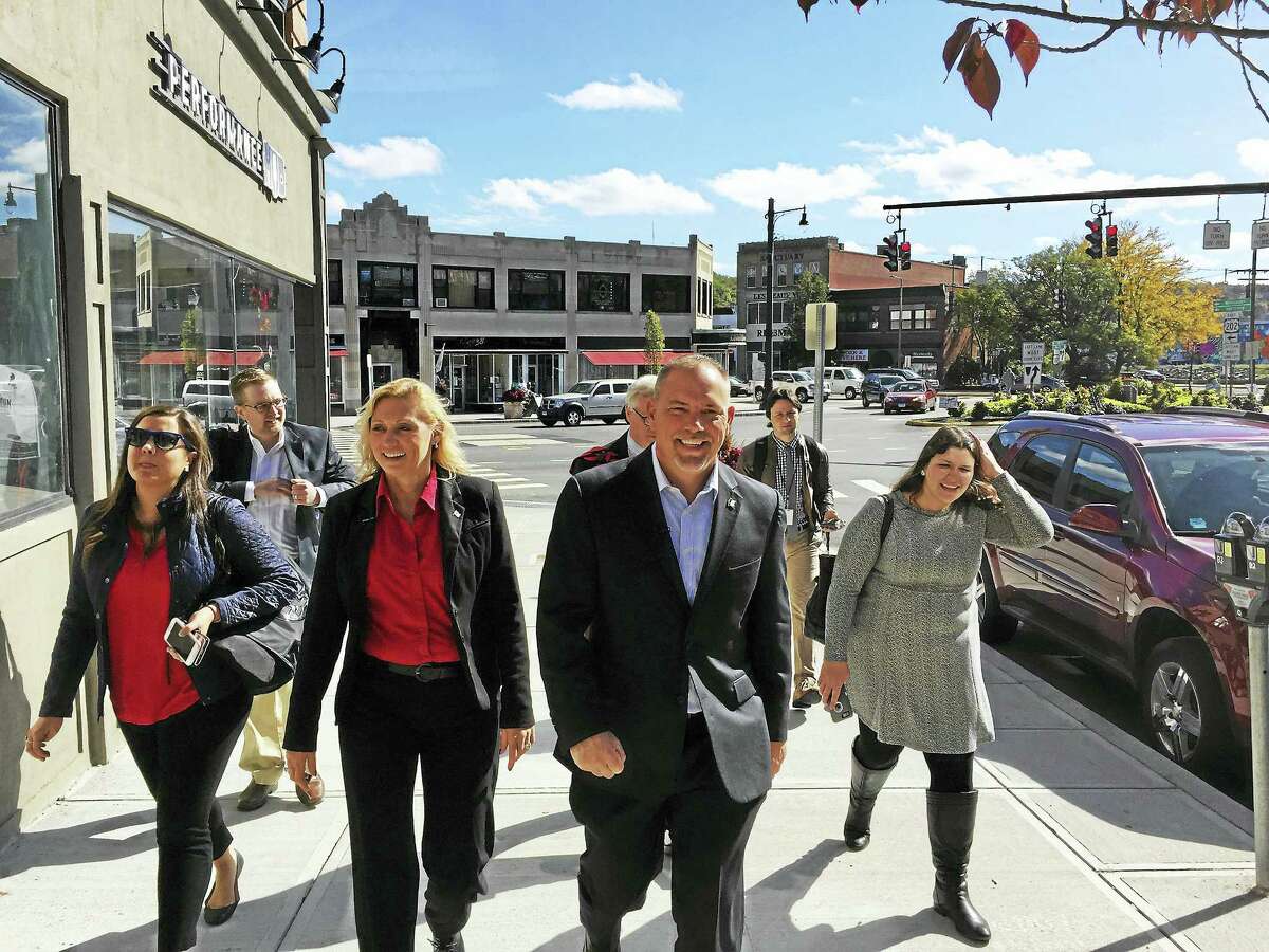 Ben Lambert - The Register CitizenHouse Majority Leader Joe Aresimowicz (D-Berlin), Rep. Michelle Cook (D-65), and William Riiska, the Democratic candidate to represent the 65th district visited businesses in downtown Torrington Wednesday.