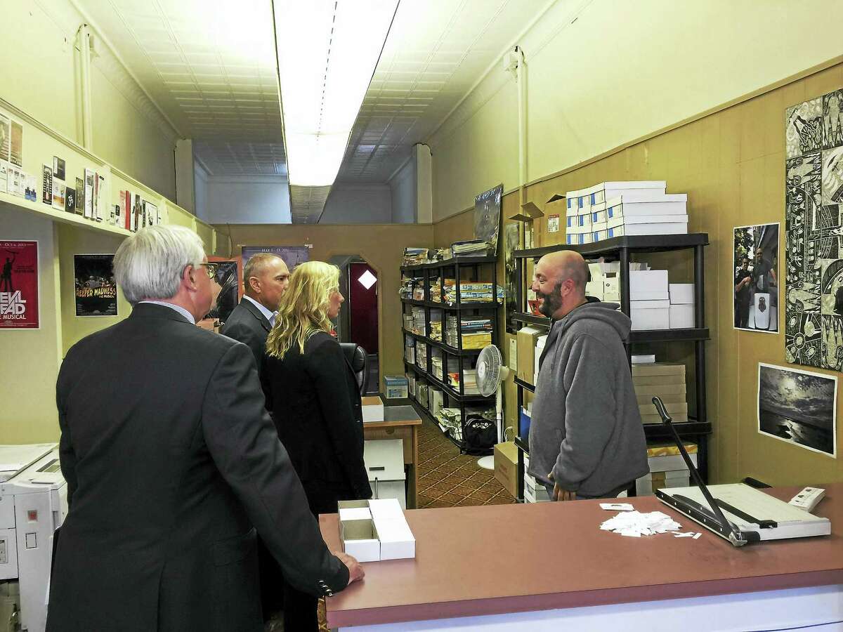 Ben Lambert - The Register CitizenHouse Majority Leader Joe Aresimowicz (D-Berlin), Rep. Michelle Cook (D-65), and William Riiska, the Democratic candidate to represent the 65th district visited businesses in downtown Torrington Wednesday.