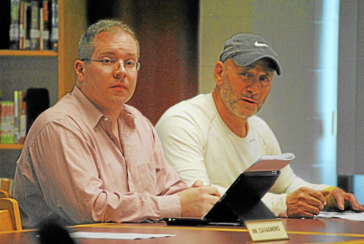 Torrington Board of Education members Daniel Thibault and Andrew Nargi discuss a $2.7 million grant from the state, given to the city, to renovate Torrington High School’s football and track. Republicans are looking for candidates for Nargi’s seat on the board after he resigned earlier this month.