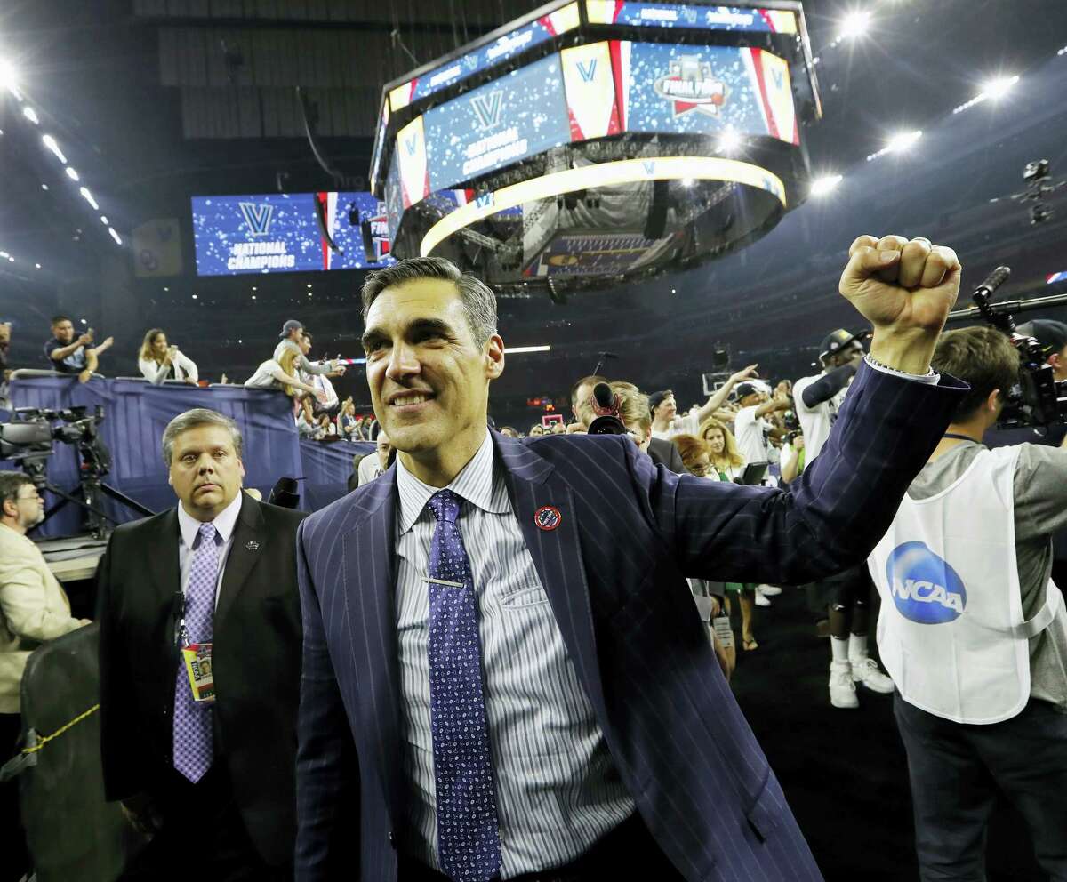 In this April 4, 2016 photo, Villanova head coach Jay Wright celebrates after the NCAA Final Four tournament college basketball championship game against North Carolina, in Houston. Defending national champion Villanova is the runaway preseason No. 1 in the Big East Conference.