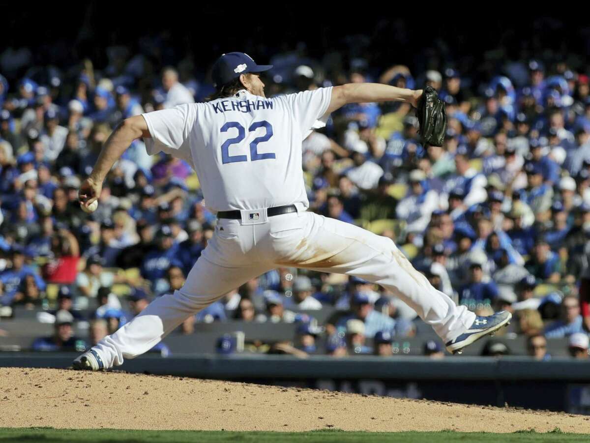 Los Angeles starting pitcher Clayton Kershaw throws against the Washington Nationals during the fourth inning in Game 4 of the National League Division Series.