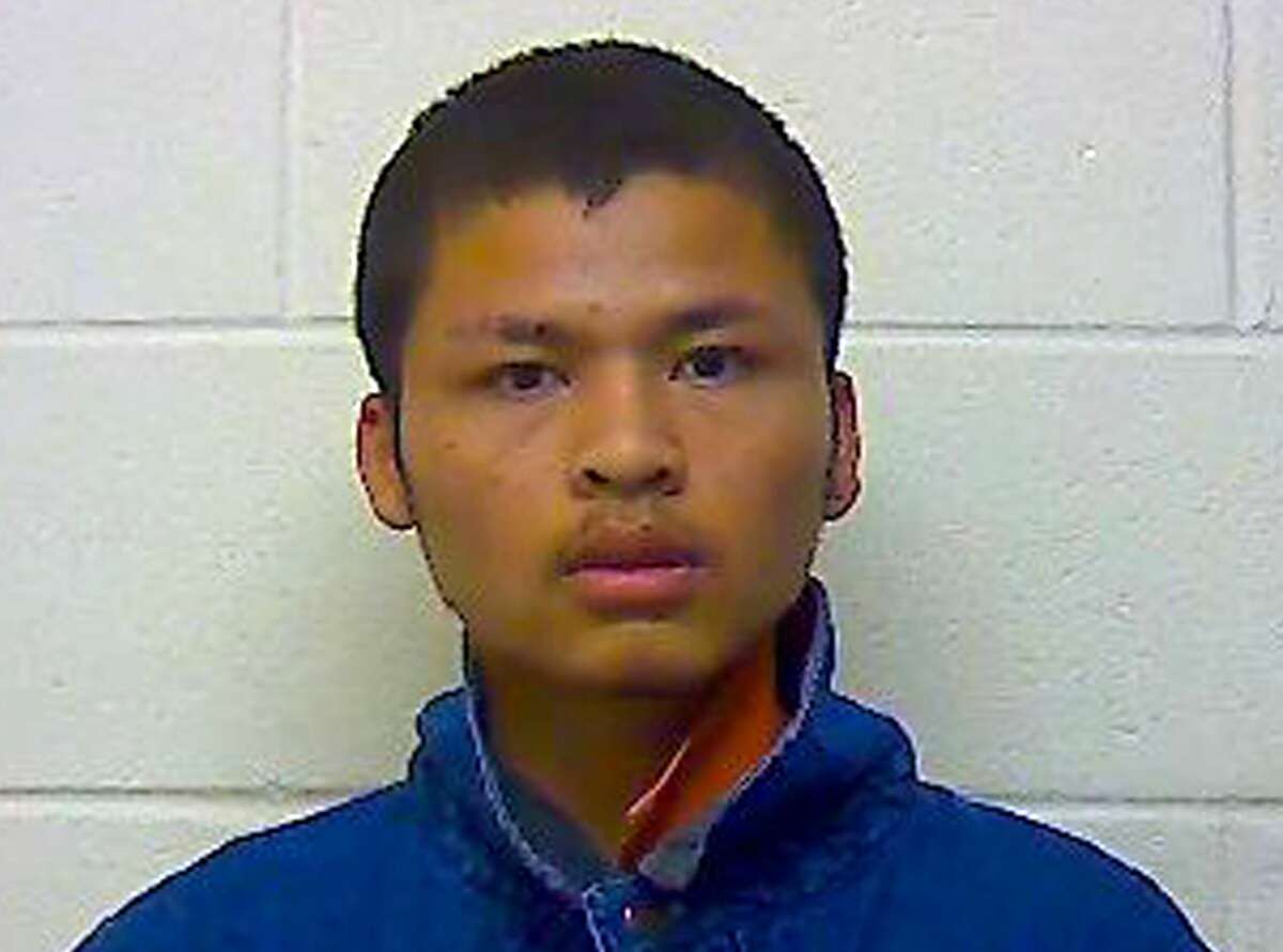 This booking mug provided by the Craven County Sheriff's Office, in North Carolina, shows Eh Lar Doh Htoo, 18, under arrest, Wednesday, March 18, 2015. Htoo is charged with assault with a deadly weapon with intent to kill. Other charges are also expected. Three children, ages 1, 5 and 12, were stabbed to death and two other people were wounded in a Burmese community in New Bern, N.C. (AP Photo/Craven County Sheriff's Office)