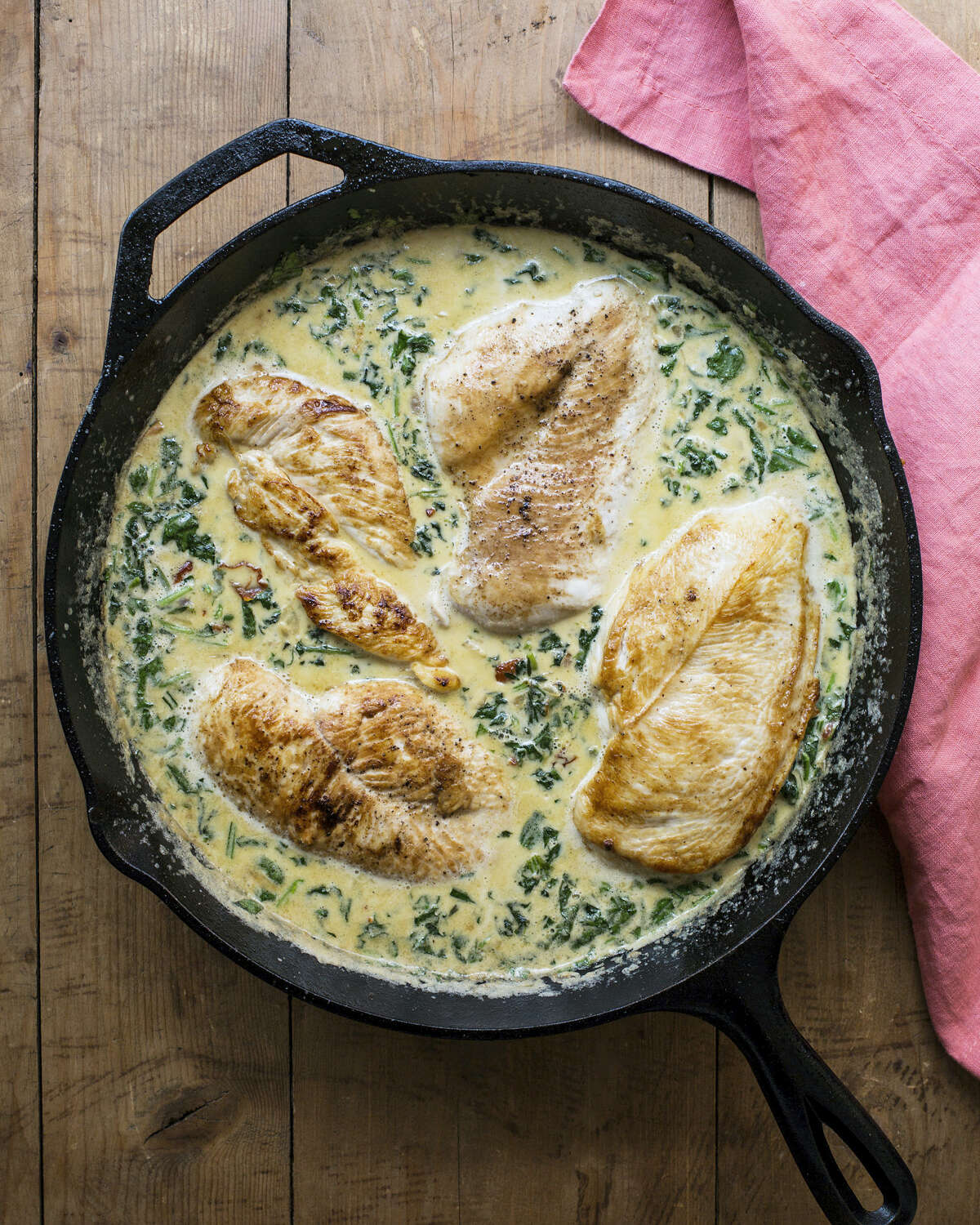 When in doubt, choose comfort food, like chicken with spinach in cream sauce.