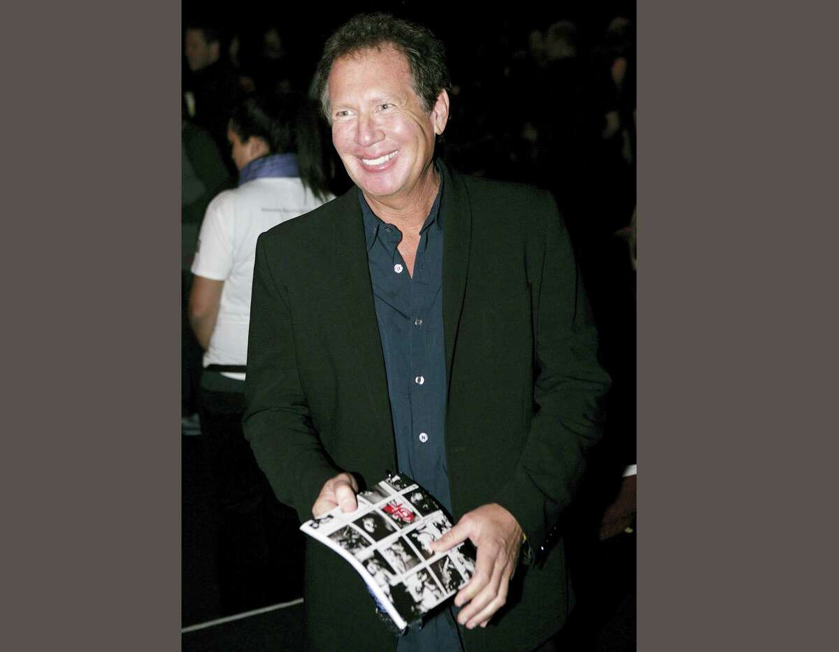 In this Oct. 17, 2006 file photo, actor Gary Shandling poses for photographers before the Jennifer Nicholson fashion show during Mercedes Benz Fashion Week in Culver City, Calif. Shandling, who as an actor and comedian pioneered a pretend brand of self-focused docudrama with “The Larry Sanders Show,” died, Thursday, March 24, 2016 of an undisclosed cause in Los Angeles. He was 66.