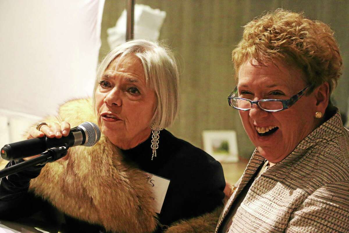 Vita West Muir, left, executive director of Litchfield Performing Arts, was given a CultureMAX Lifetime Achievement Award for her work establishing the Litchfield Jazz Festival, Litchfield Jazz Camp and more. With her is JoAnn Ryan, Northwest Connecticut’s Chamber president and CEO, as well as mistress of ceremonies at the Northwest Connecticut Arts Council presentation at Morrison Gallery in Kent on Tuesday night.